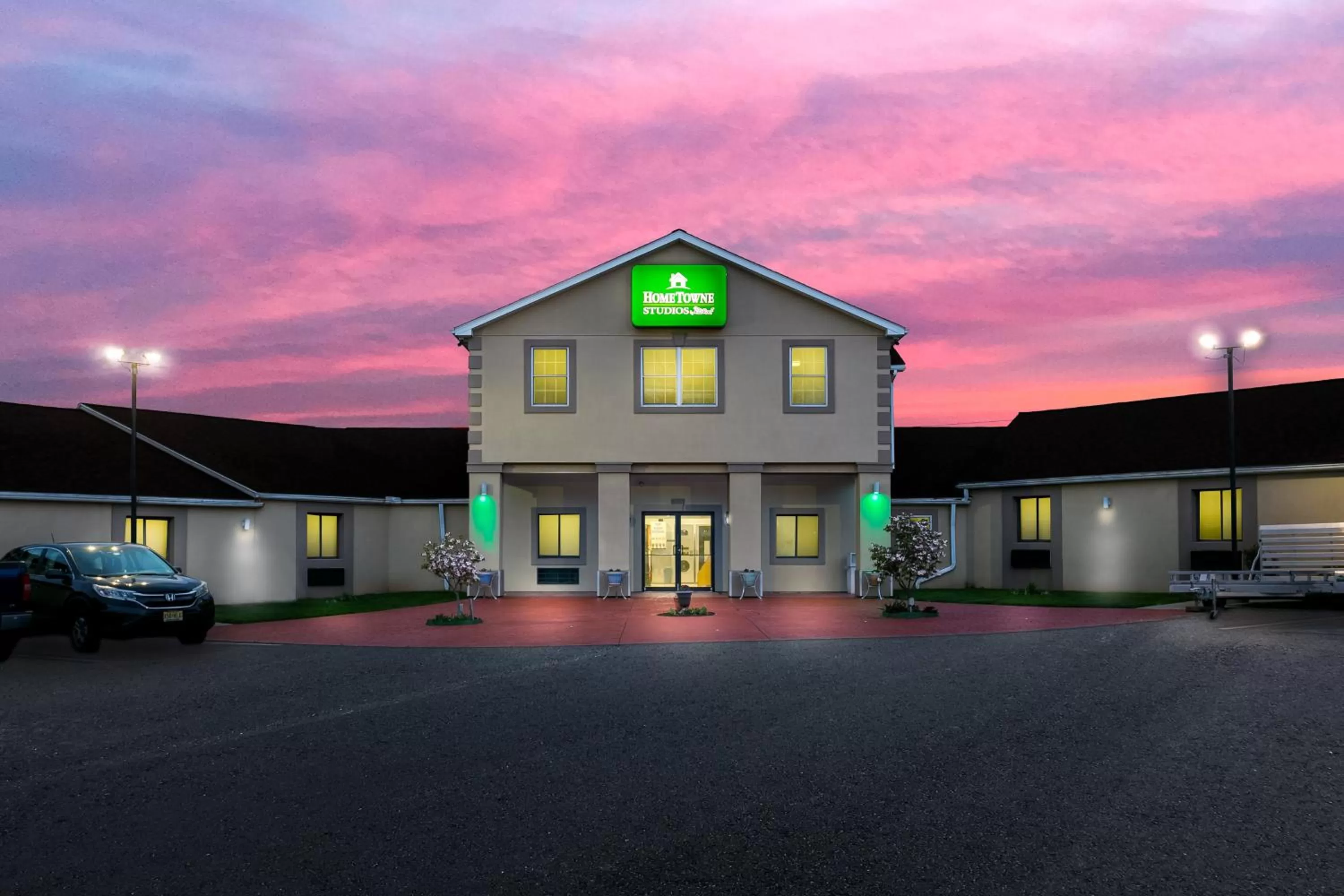 Property building in HomeTowne Studios by Red Roof Denver, PA