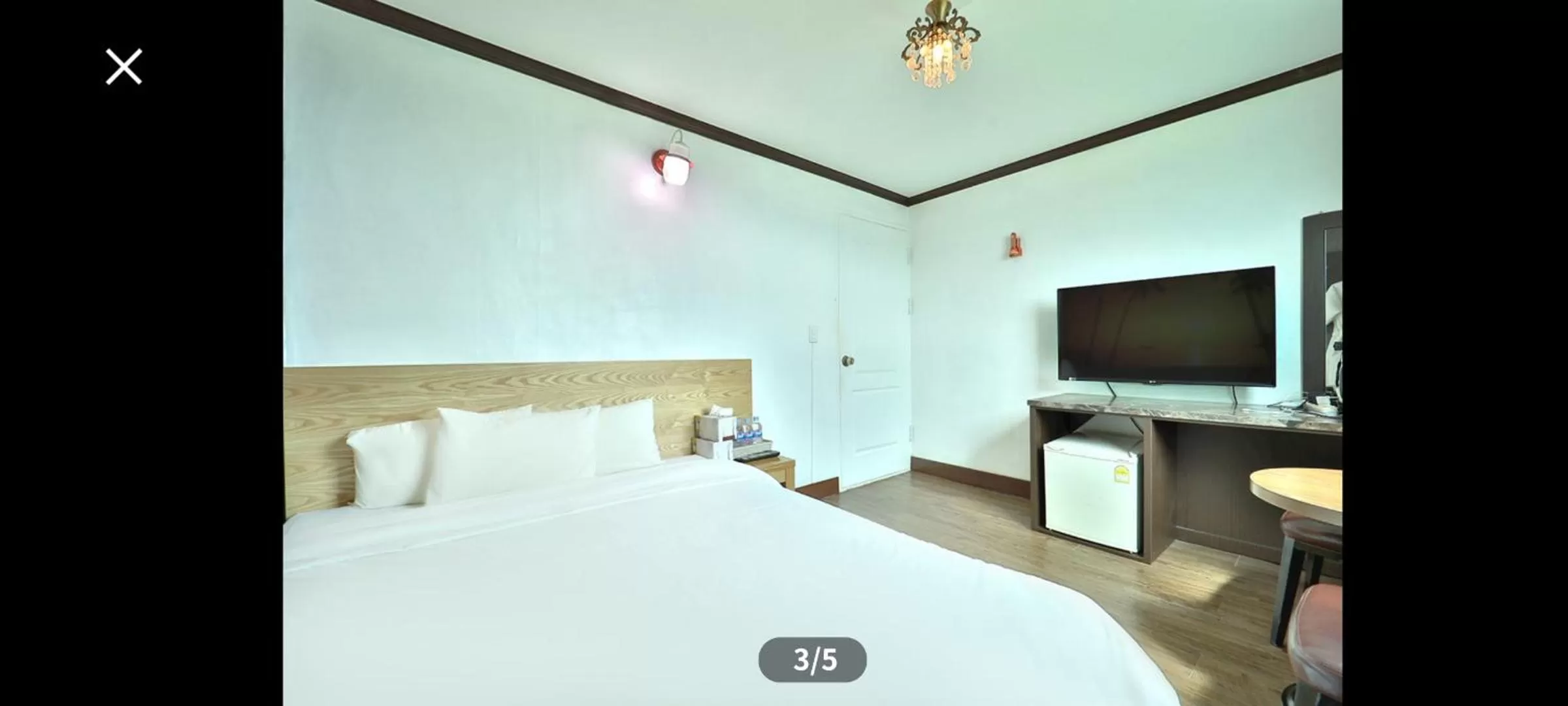 Bed in Saipan Motel with Sea View