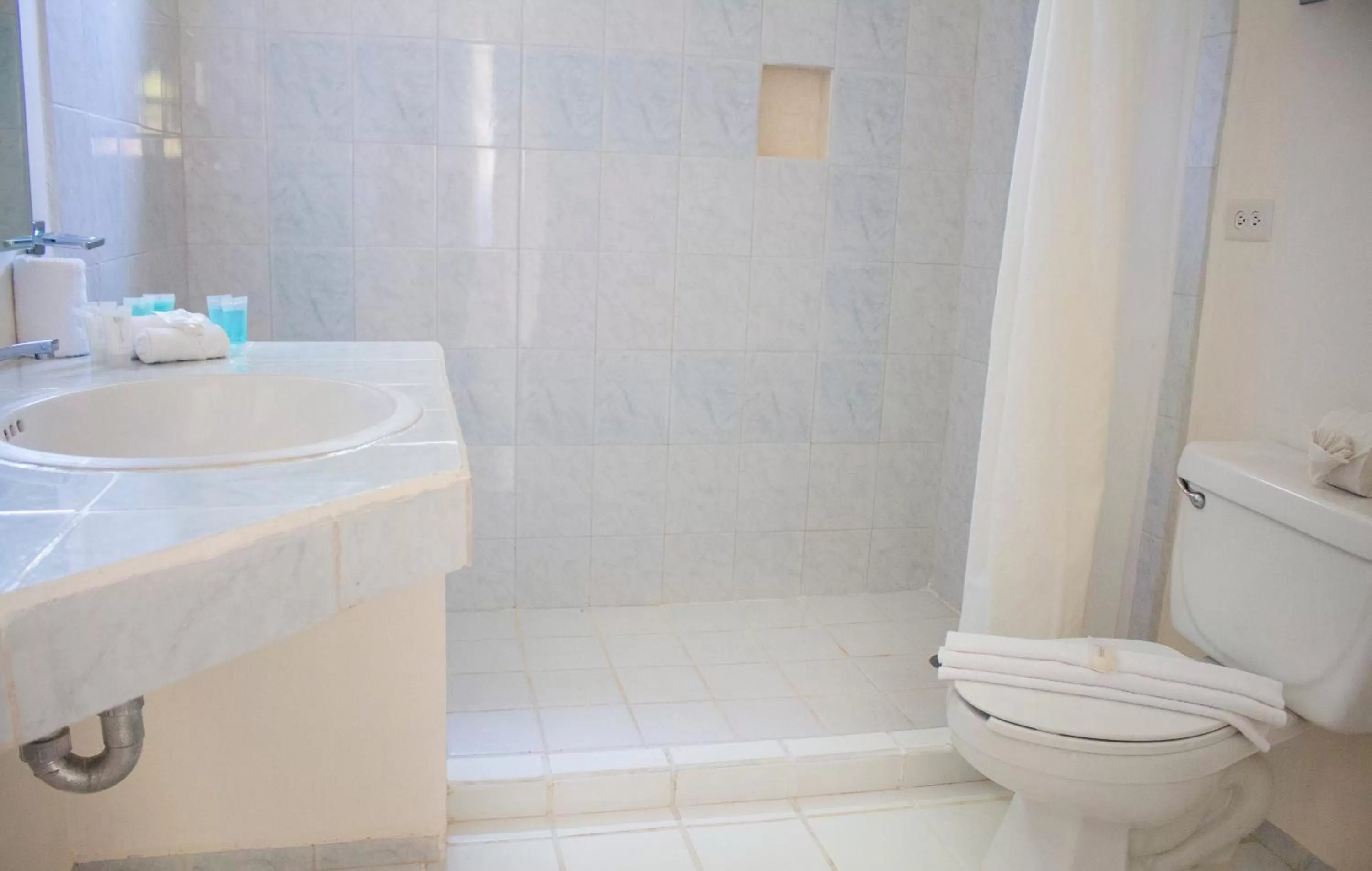 Bathroom in All Ritmo Cancun Resort & Water Park