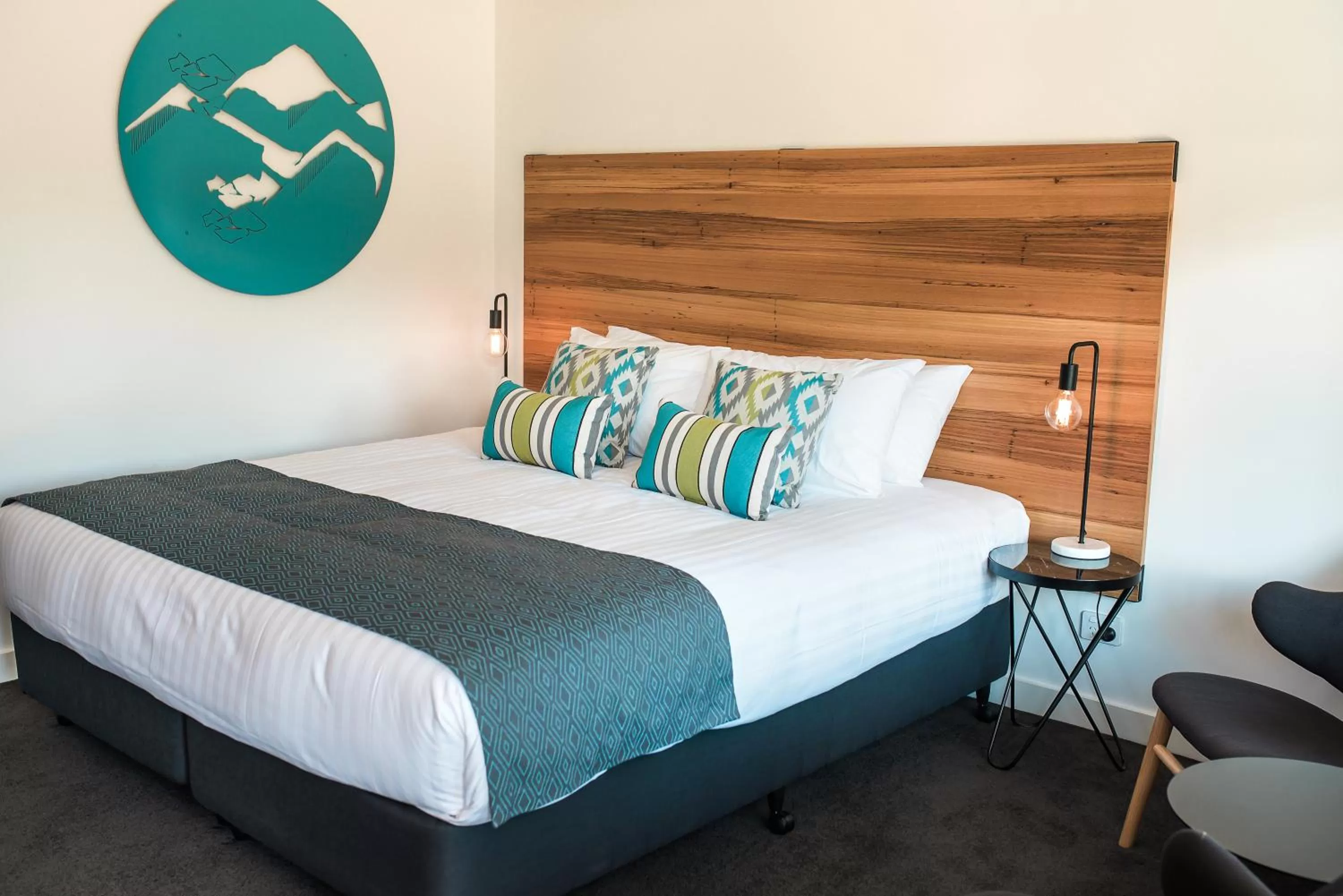 Bed in Bright Colonial Motel