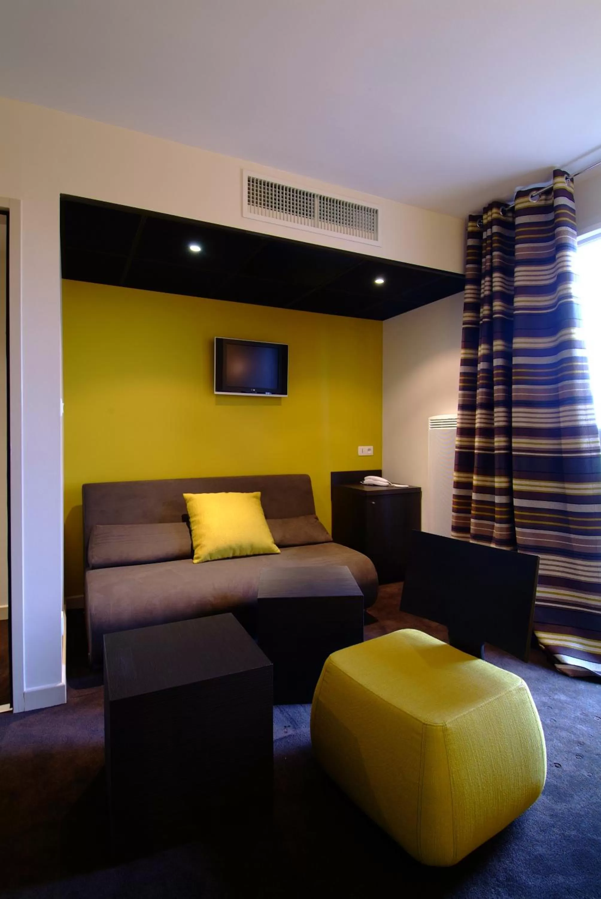 Photo of the whole room in The Originals Boutique, Hôtel Marytel, Montbrison