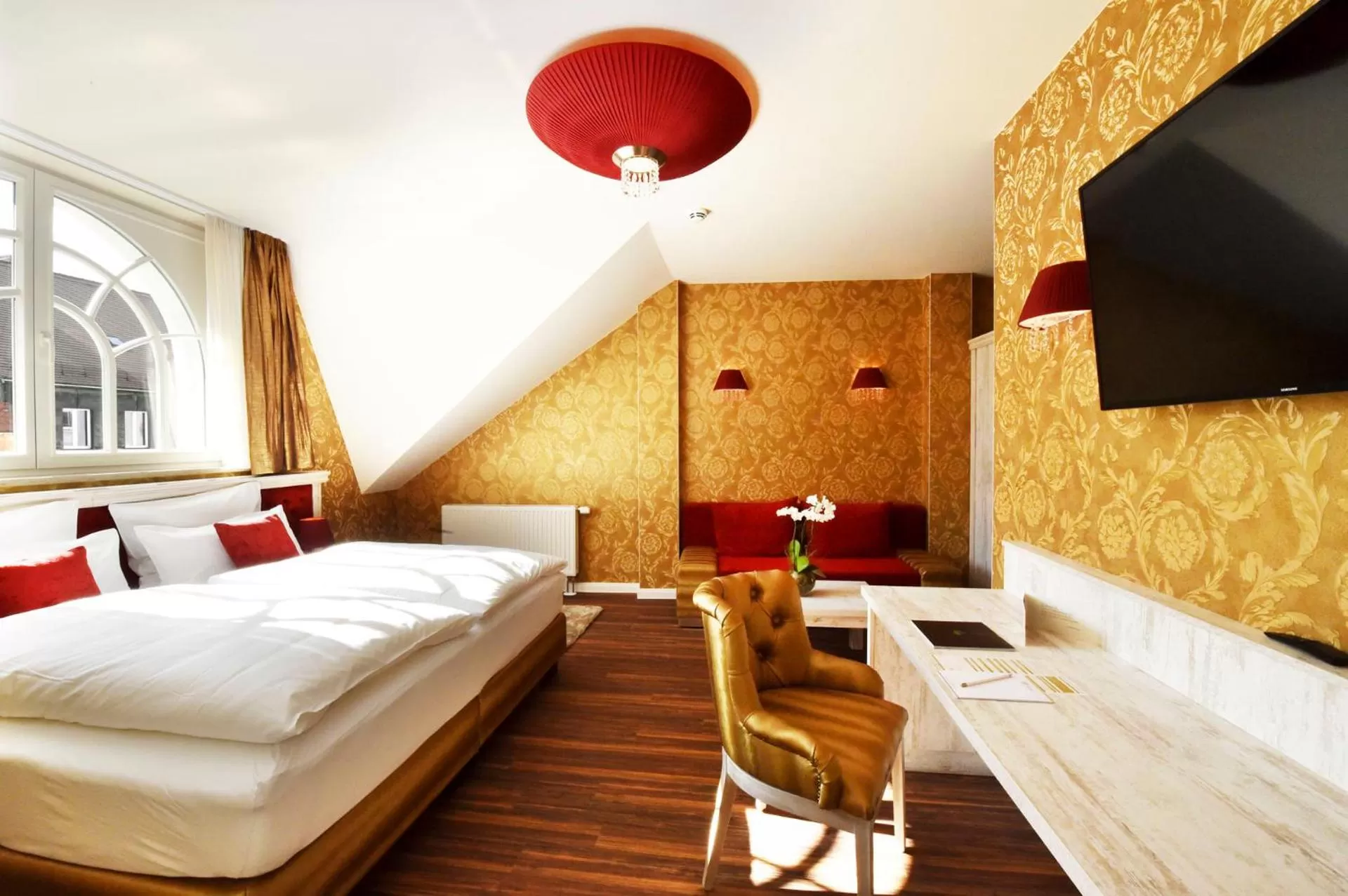 Photo of the whole room, Bed in MOMENTS Boutique Hotel