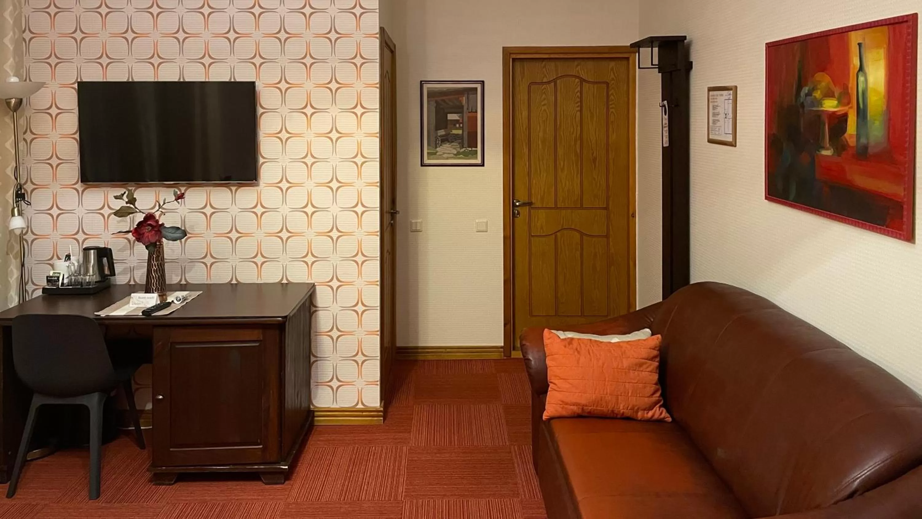 TV and multimedia, TV/Entertainment Center in Hotel Vilhelmine