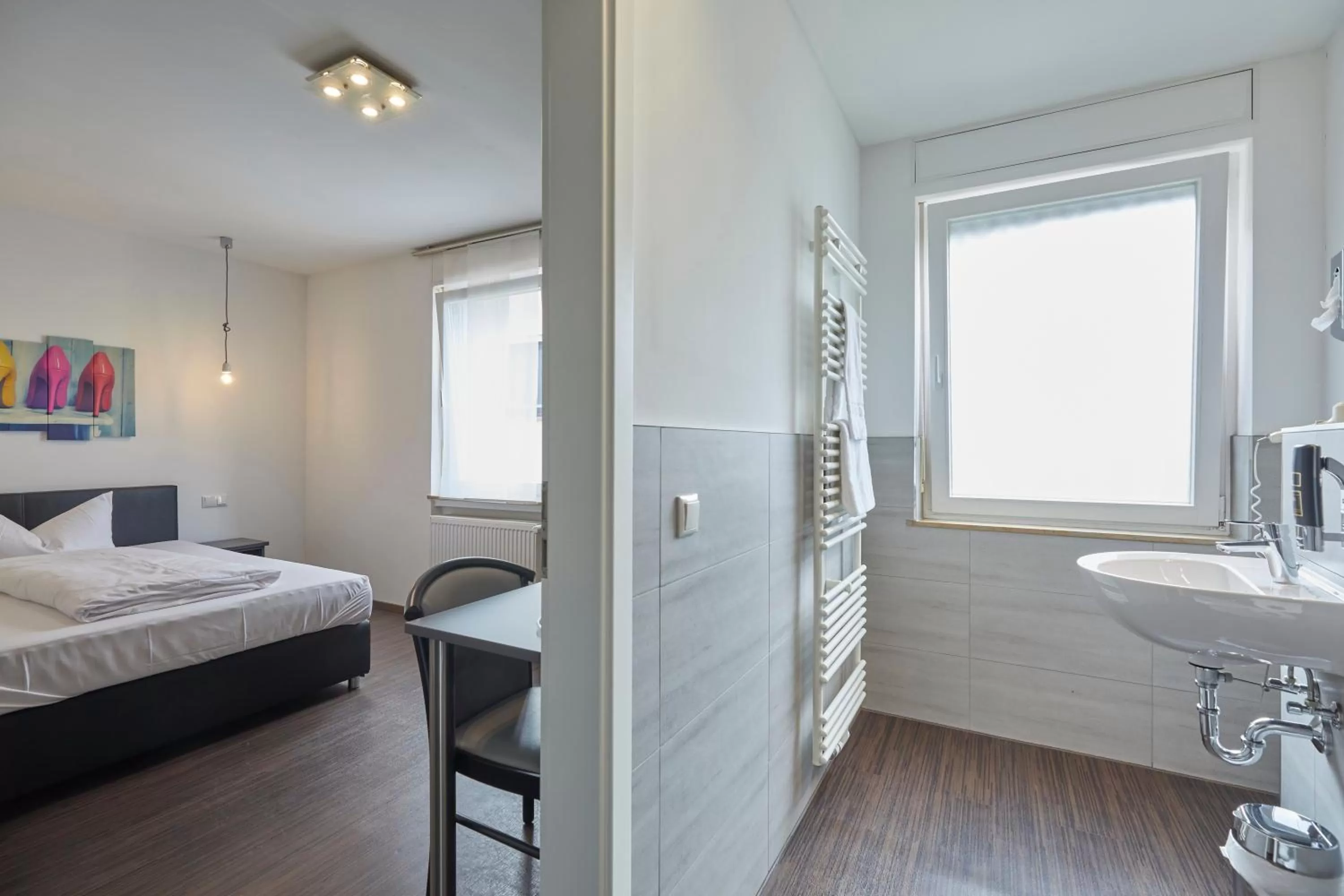 Photo of the whole room, Bed in Hotel Schlemmer Das familäre Altstadt - Hotel mit Herz