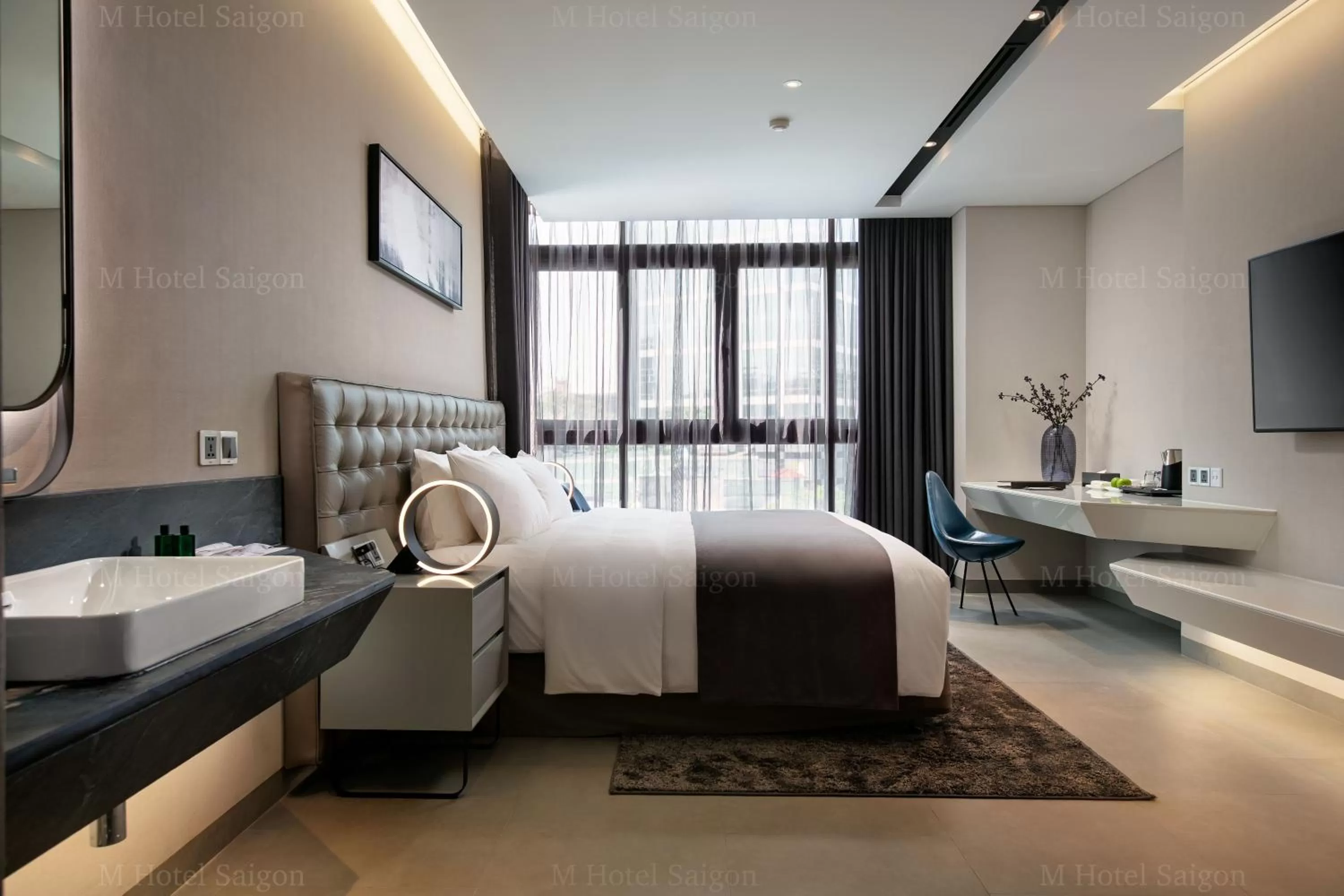 Photo of the whole room, Bed in M Hotel Saigon