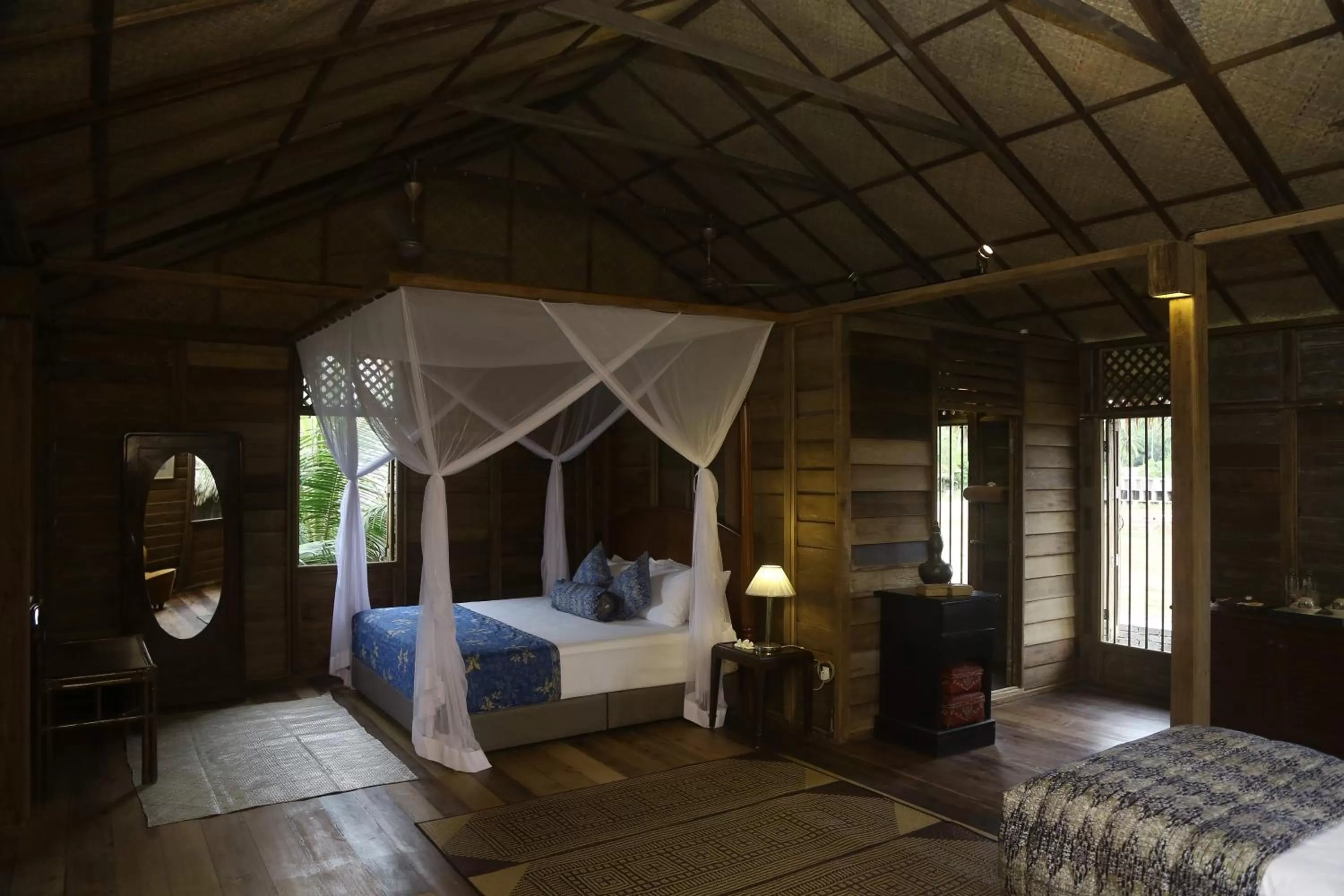 Bed in Kunang Kunang Heritage Villas