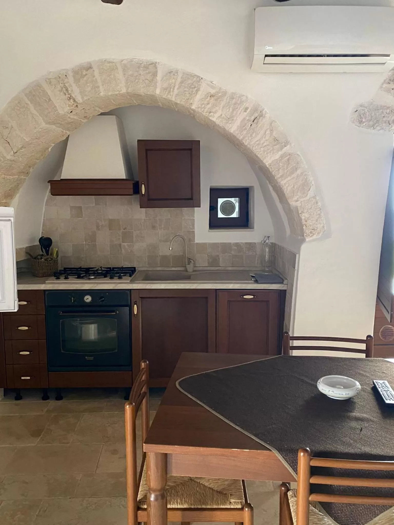 Kitchen/Kitchenette in Trulli Antichi Mestieri - Widespread Trulli in the historic center