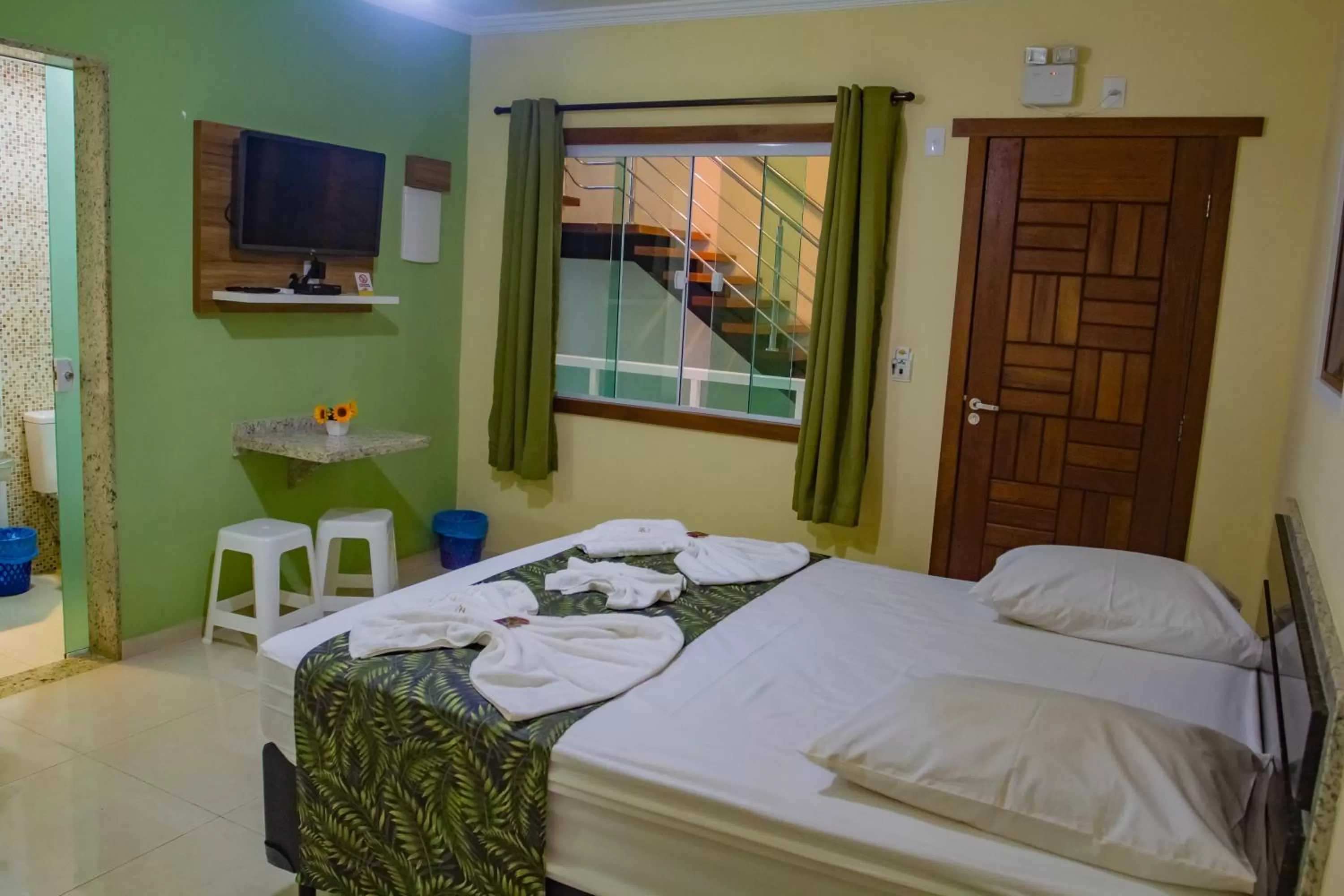 Bed in Pousada Palmares