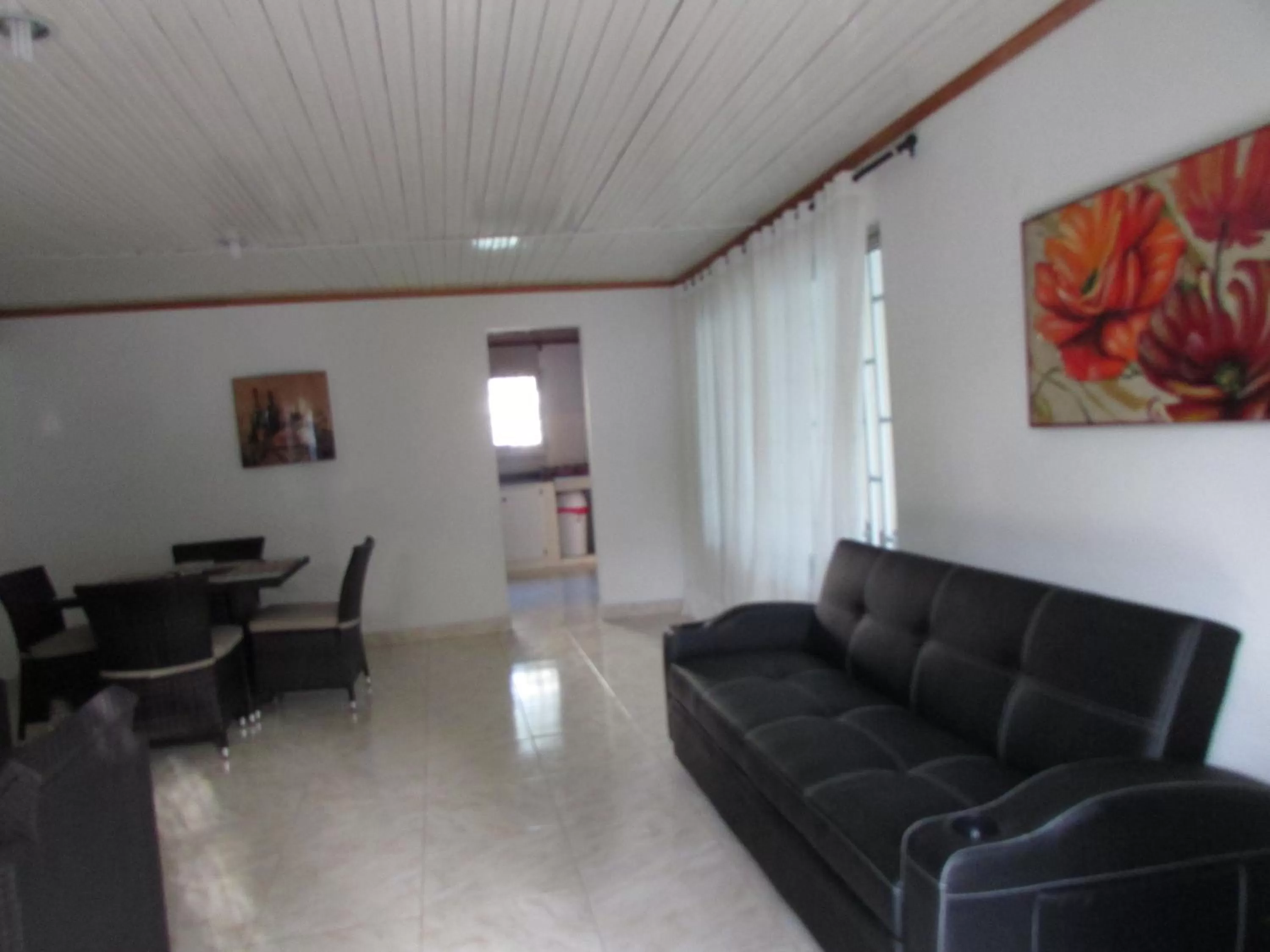 Communal lounge/ TV room, Seating Area in Posada Hostal Miss Marlly