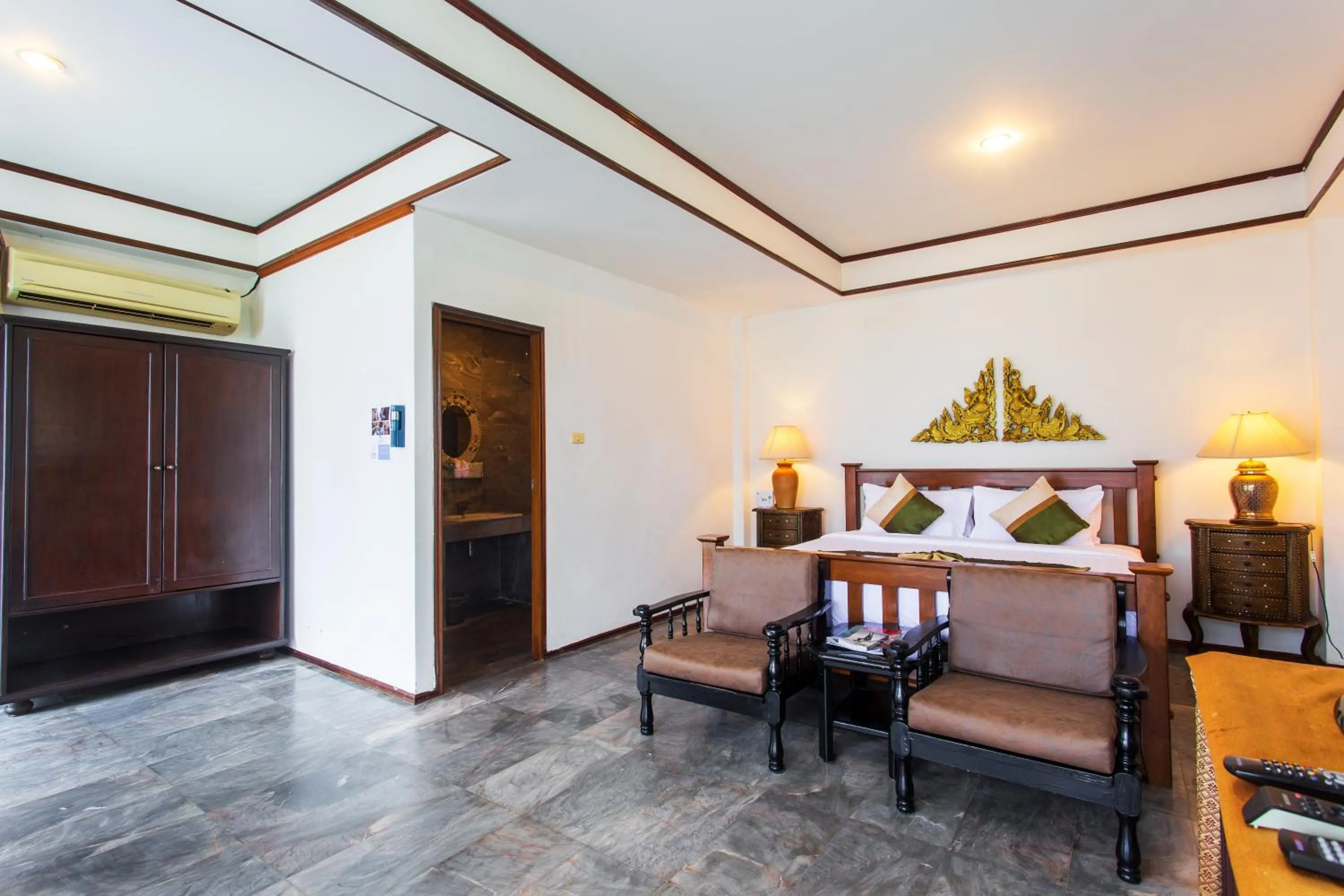 Bed in Rajapruek Samui Resort - SHA Plus