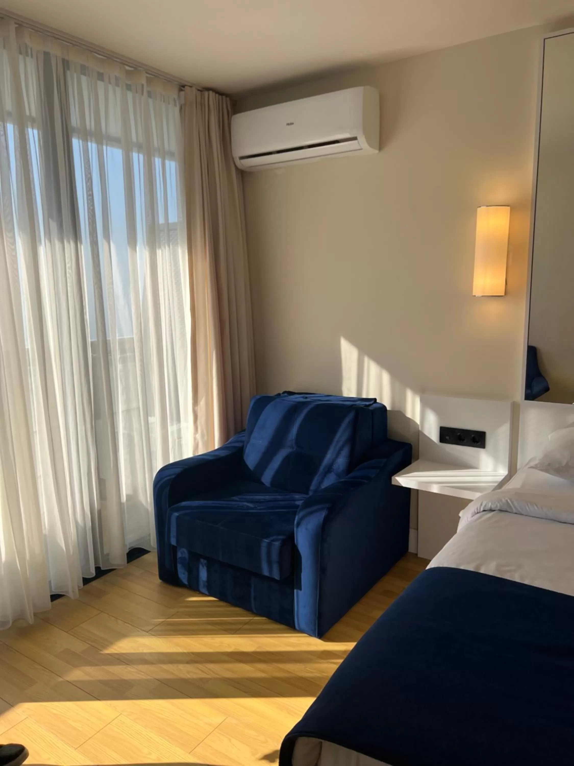 Bed, Seating Area in BaTumi ApartHoTel Black Sea coast