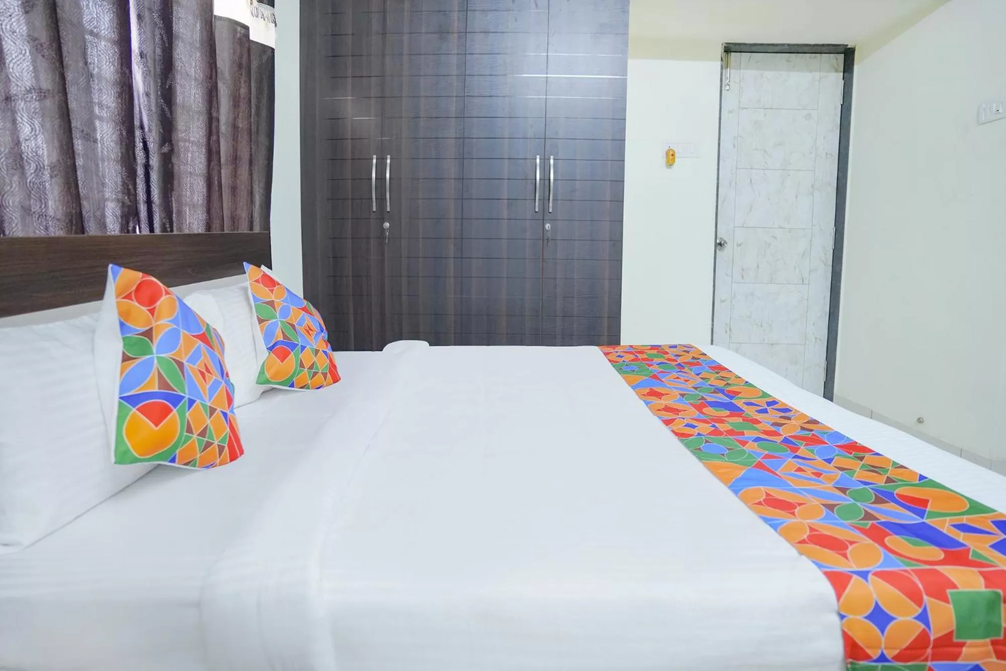 Bed in FabExpress Town Space Apartment