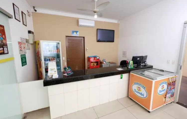 Lobby or reception, Kitchen/Kitchenette in Hotel Portela III