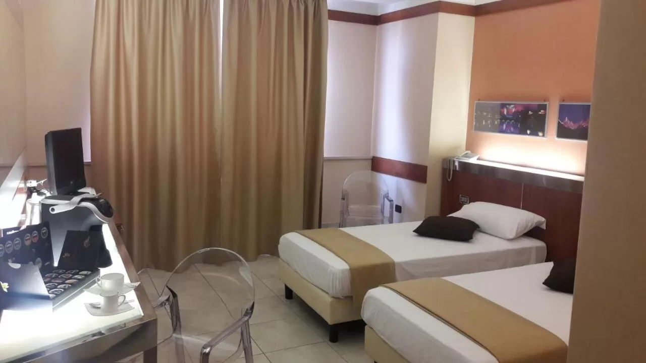 Bed in Hotel Artemide