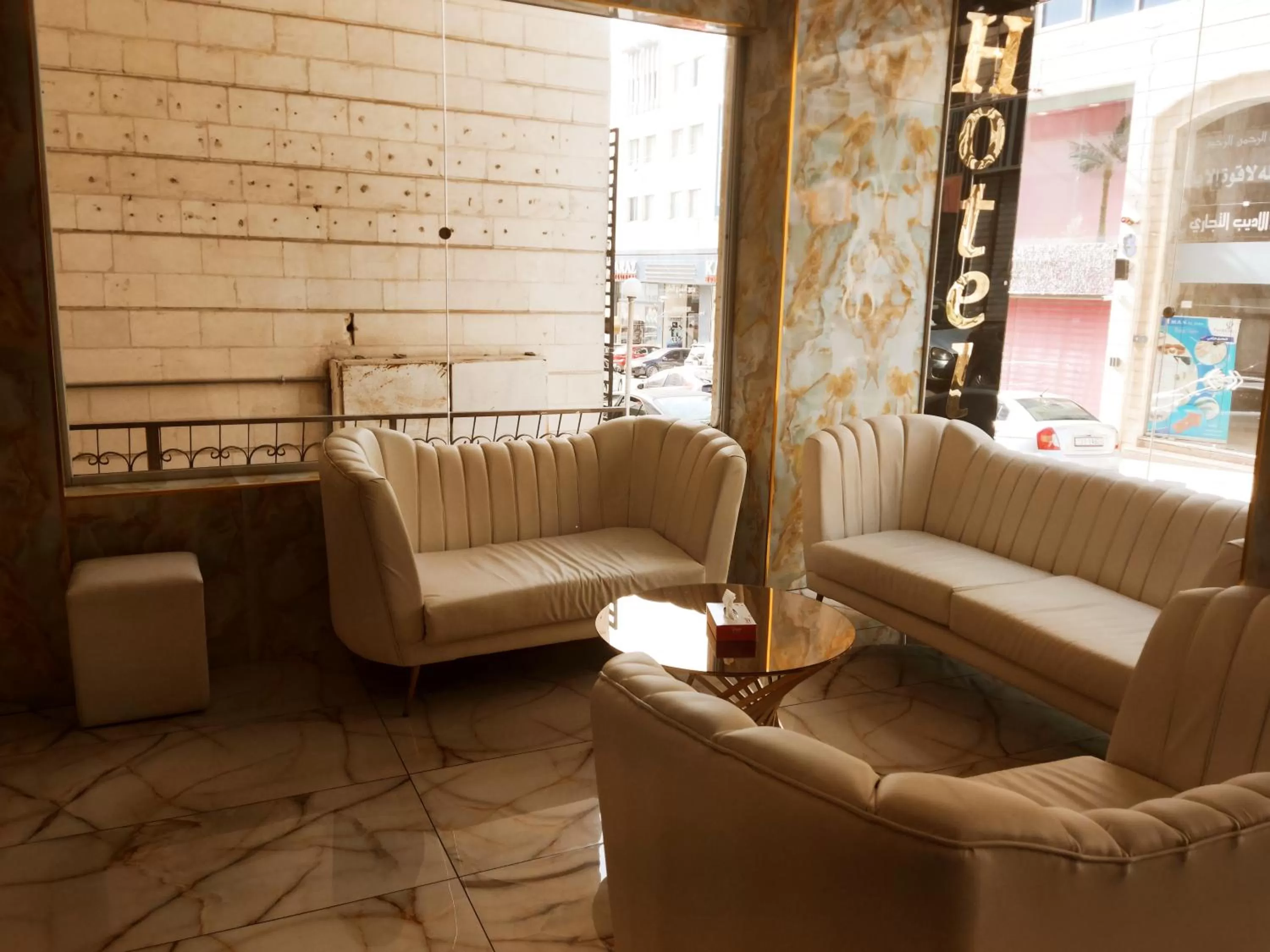 Seating area in Golden Plaza Hotel