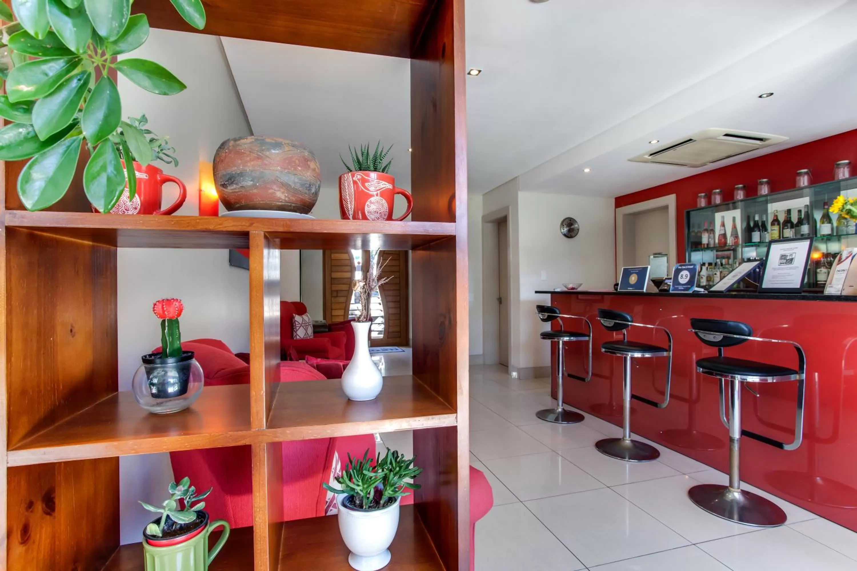 Lounge or bar in The One 8 Hotel in Green Point - Solar Power