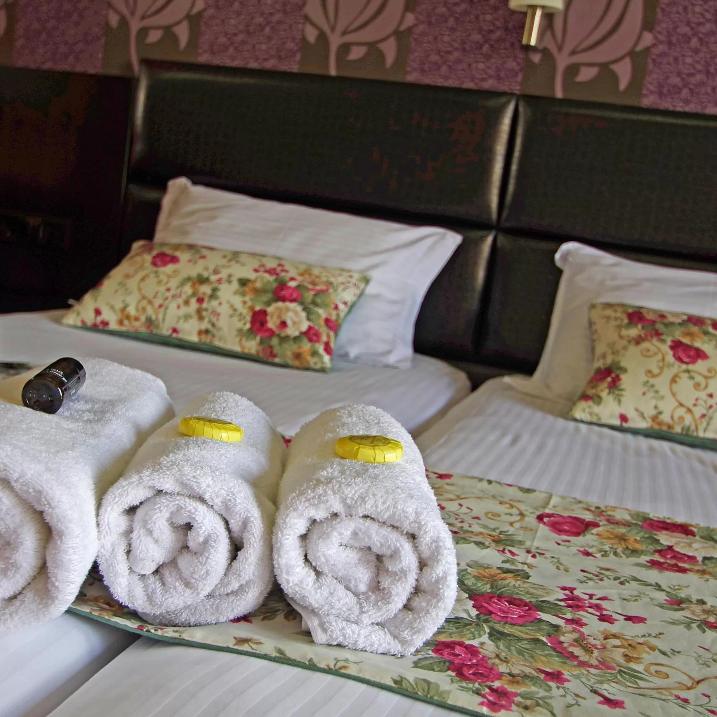 Bed in Principal New Leisure Hotel