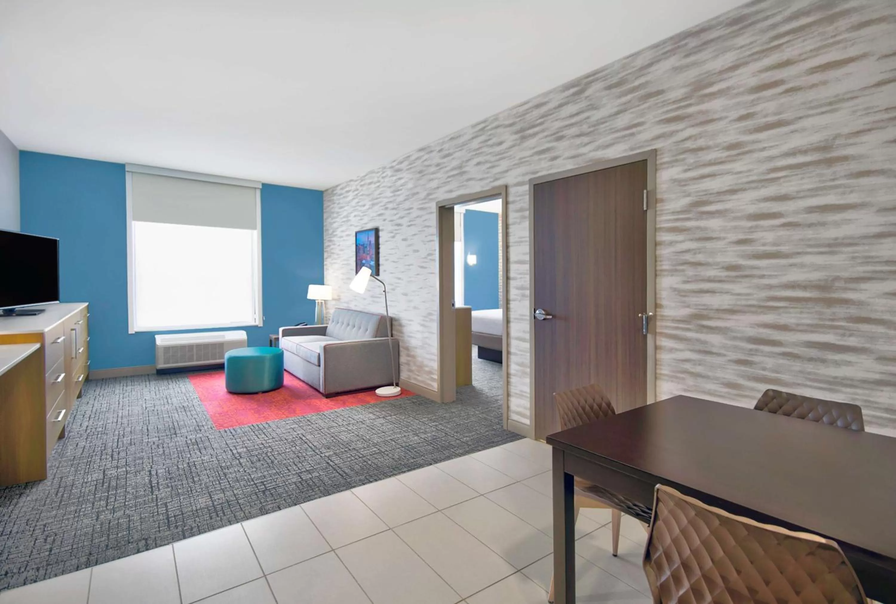 Living room, Bed in Home2 Suites By Hilton Whitestown - Indianapolis Northwest