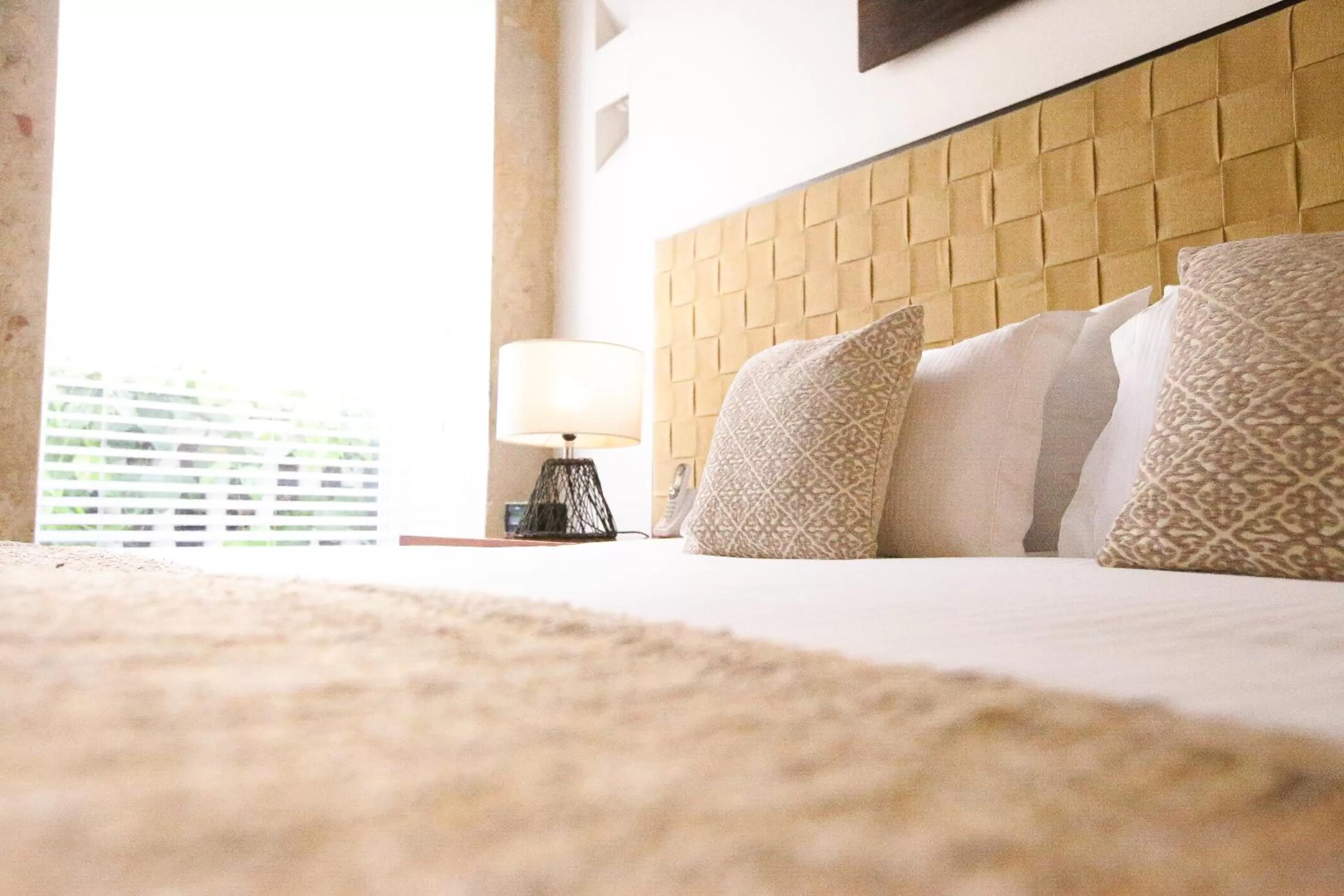 Decorative detail, Bed in Casa Claver Loft Boutique Hotel