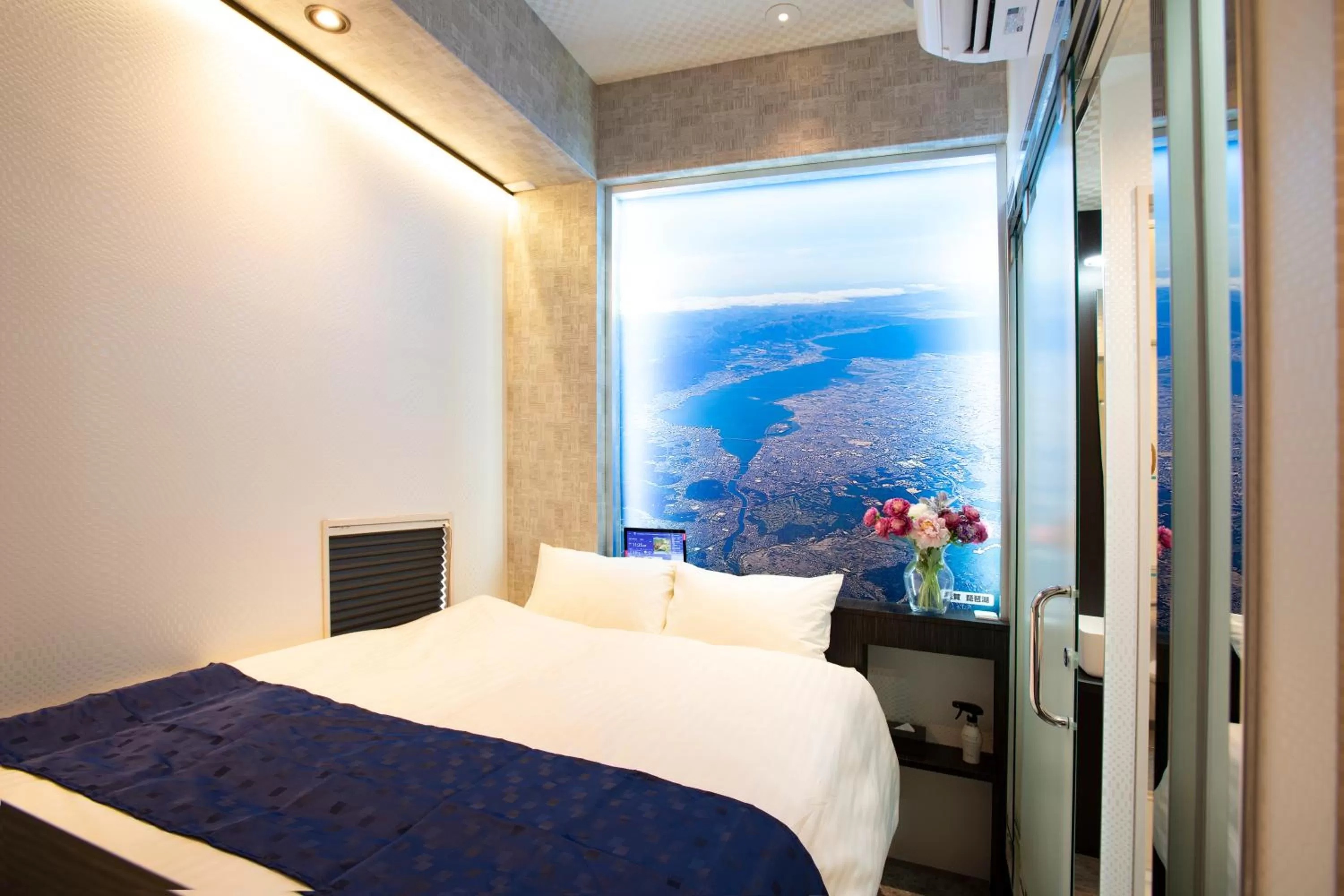 Bed in Pinpon Hotel Hiroshima