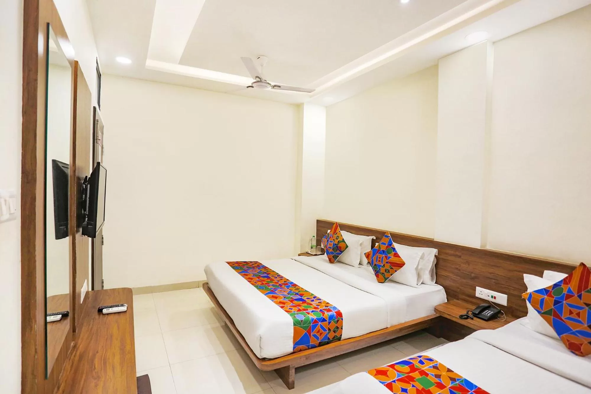 Bed in FabHotel Balaji Paradise