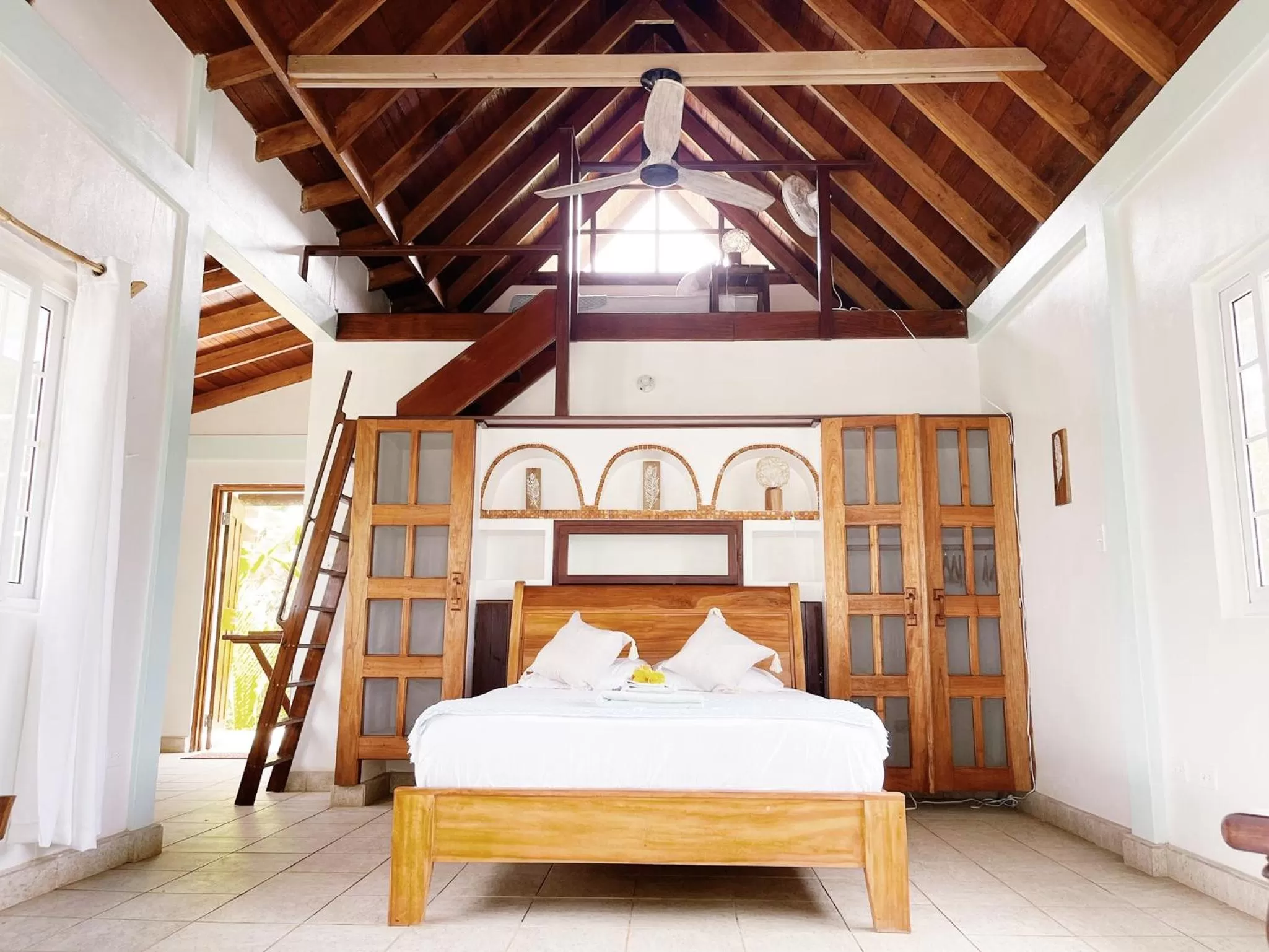 Photo of the whole room, Bed in Bird Island Bungalows