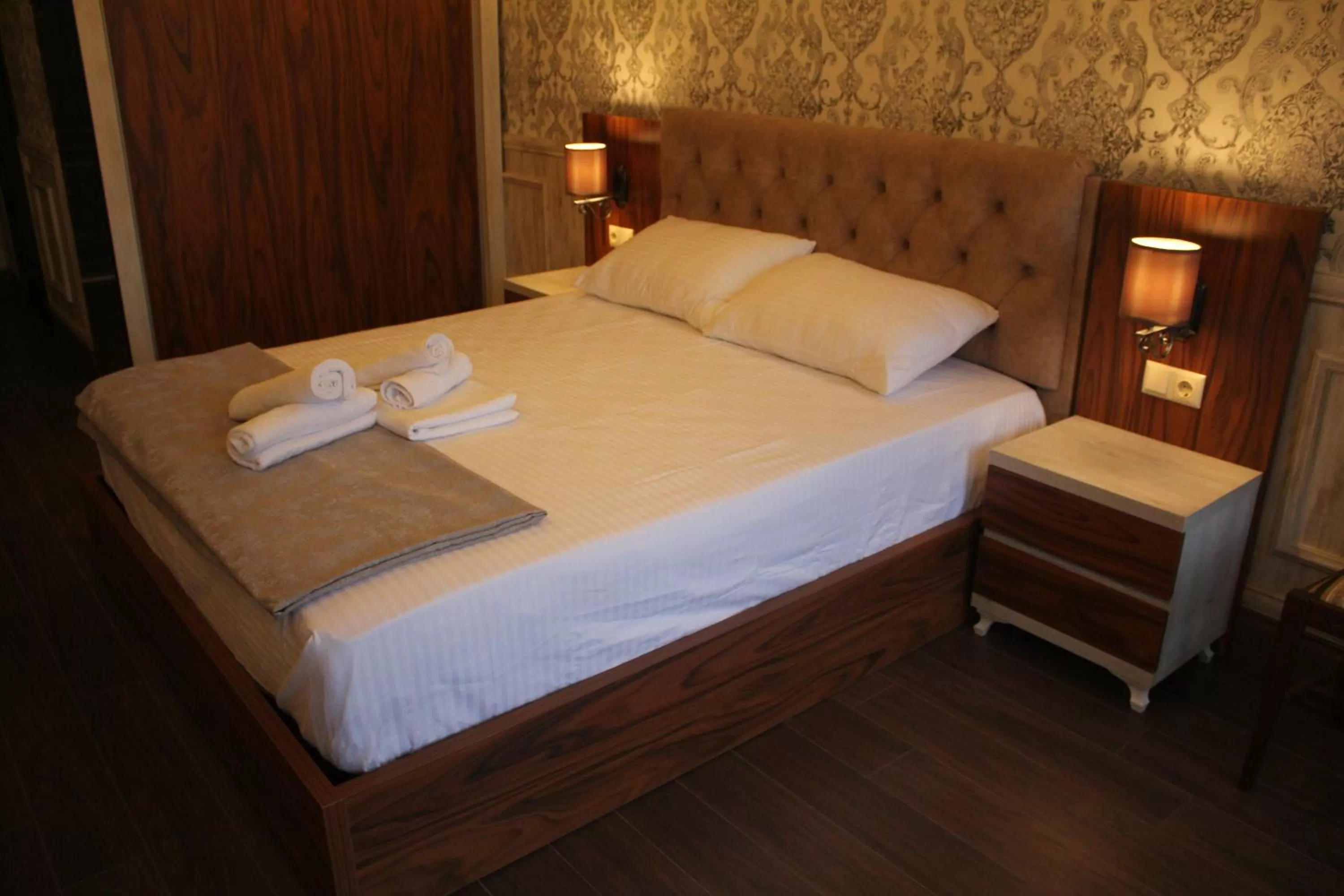 Bed in MELINI Boutique Hotel