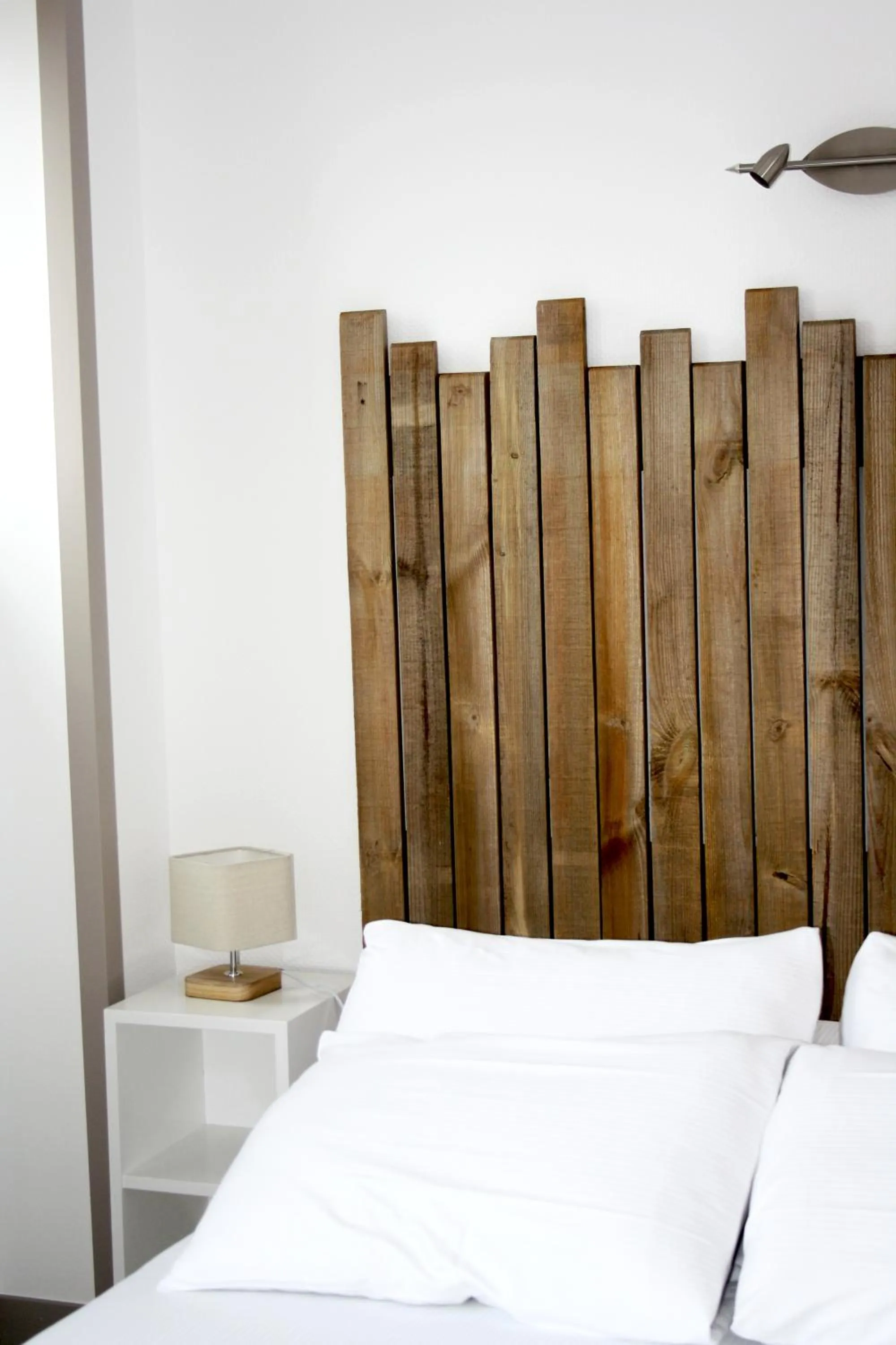 Bed in Logis Hôtel Sea View