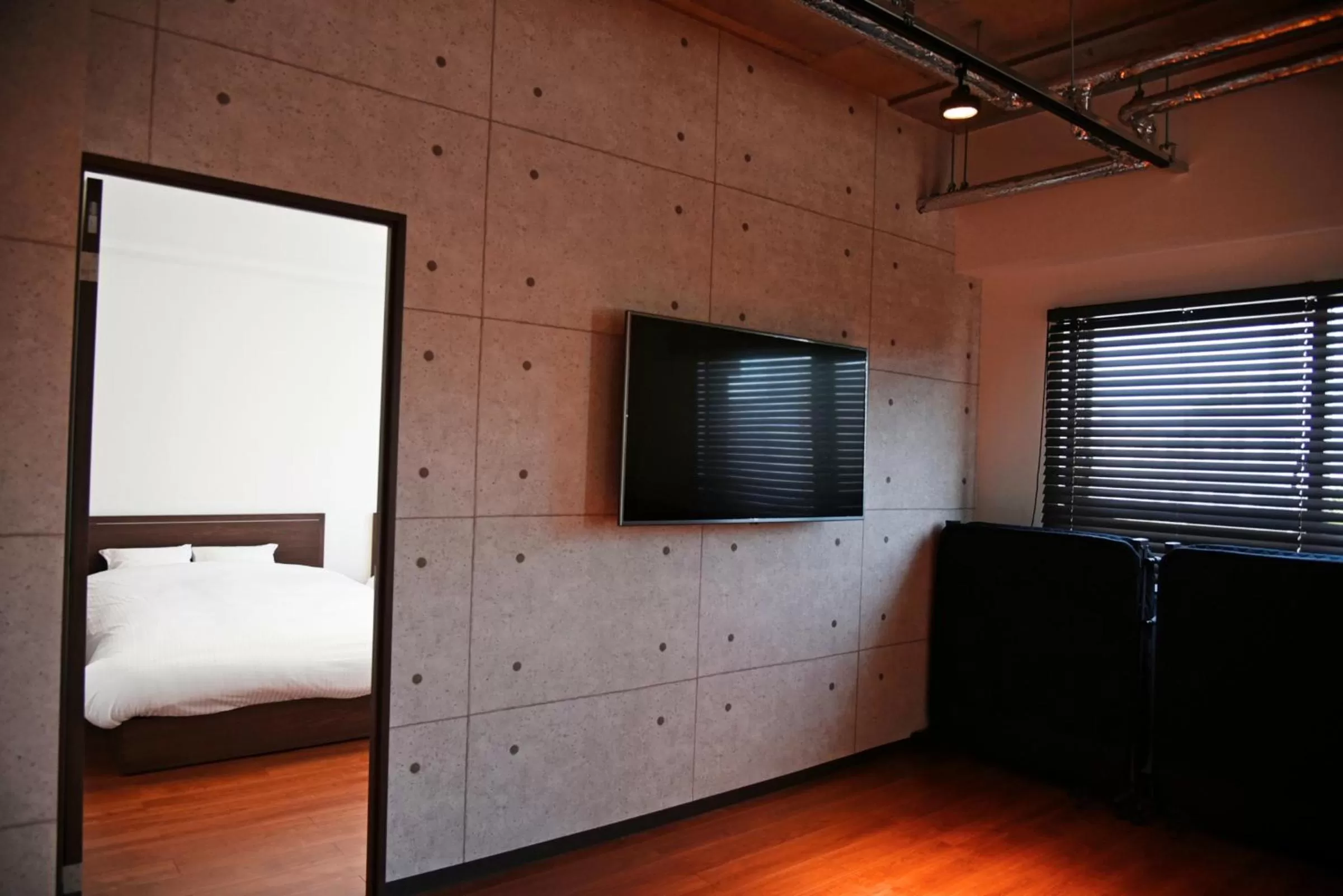 TV and multimedia, TV/Entertainment Center in Hostel PLEASURE MARUYAMA