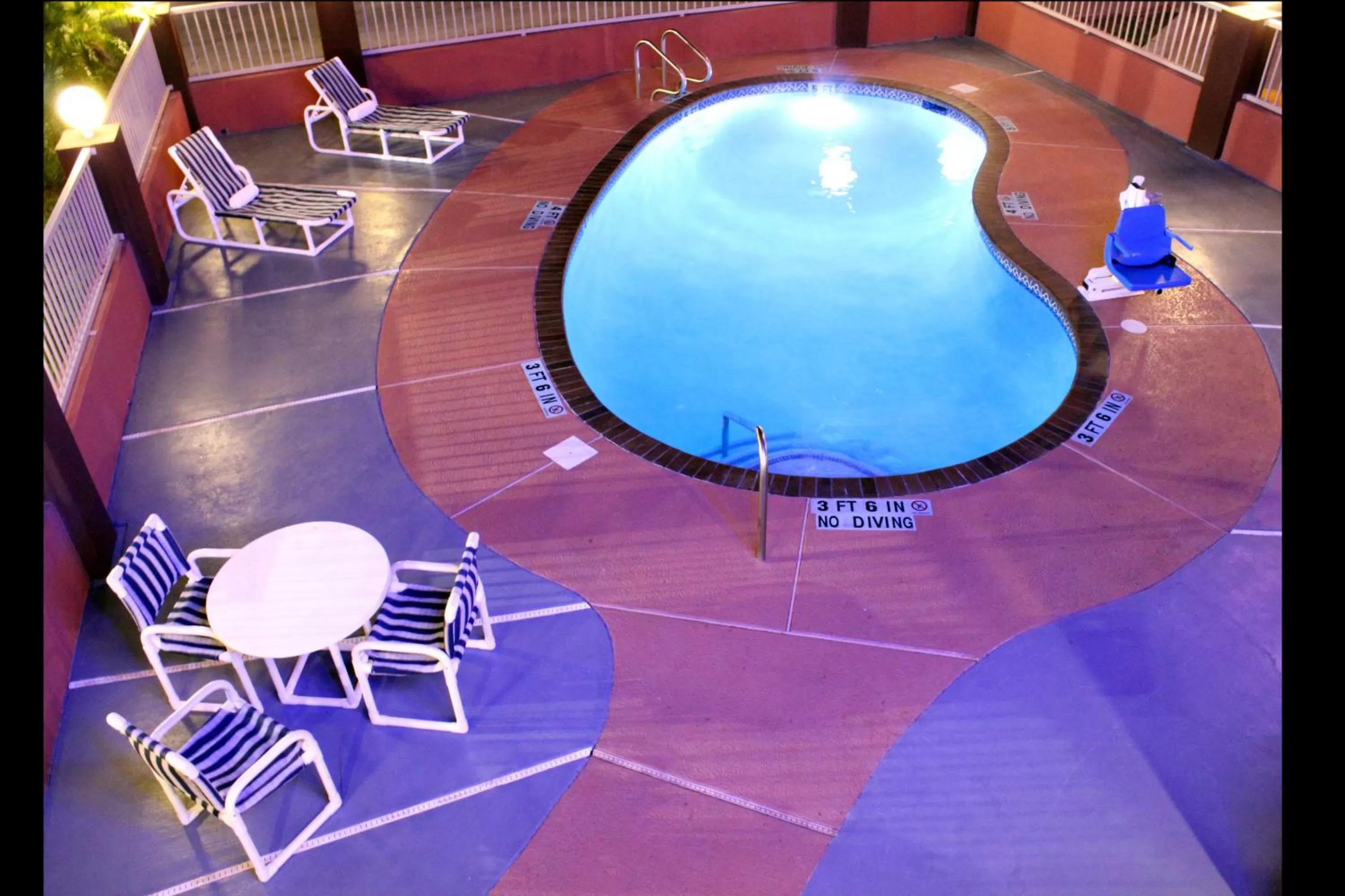 Swimming pool in Texas Inn & Suites McAllen at La Plaza Mall and Airport