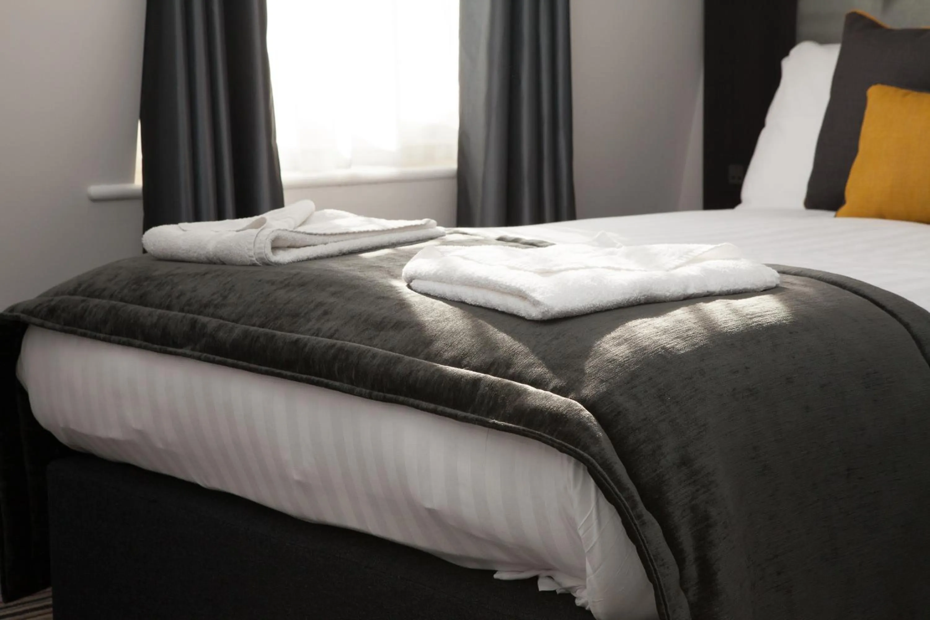 Bed in The Tudor Inn Hotel