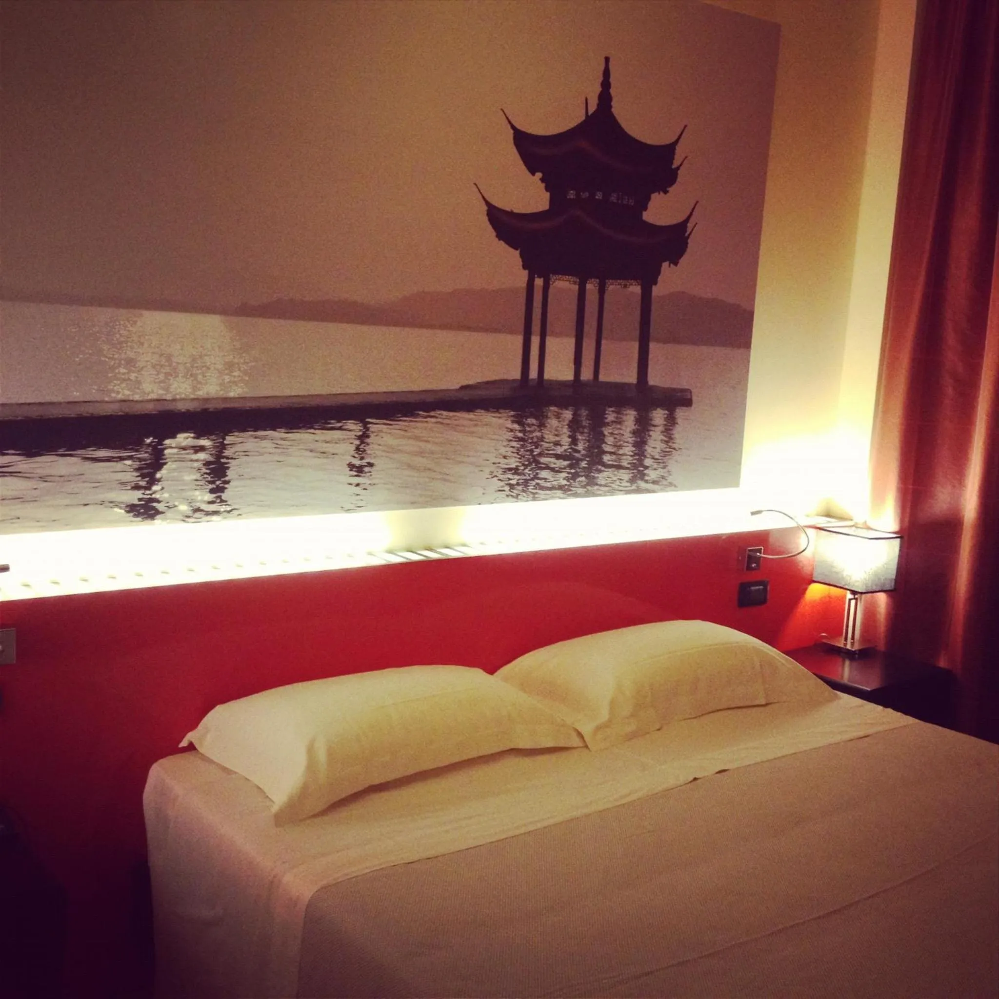 Bed in Amatì Design Green Hotel