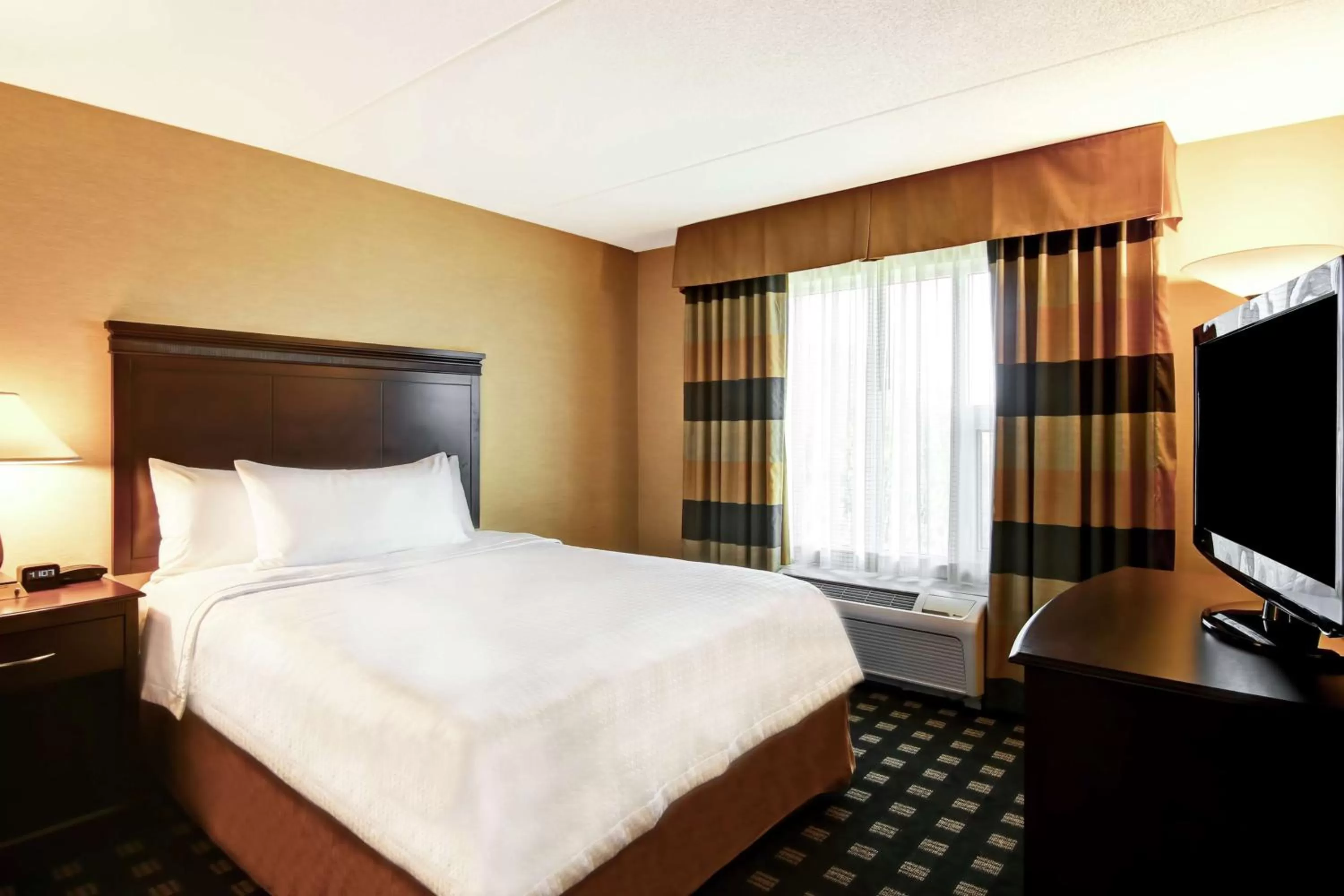 Bed in Homewood Suites by Hilton Toronto Airport Corporate Centre