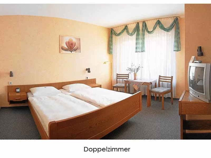 Bed in Hotel Keinath Stuttgart