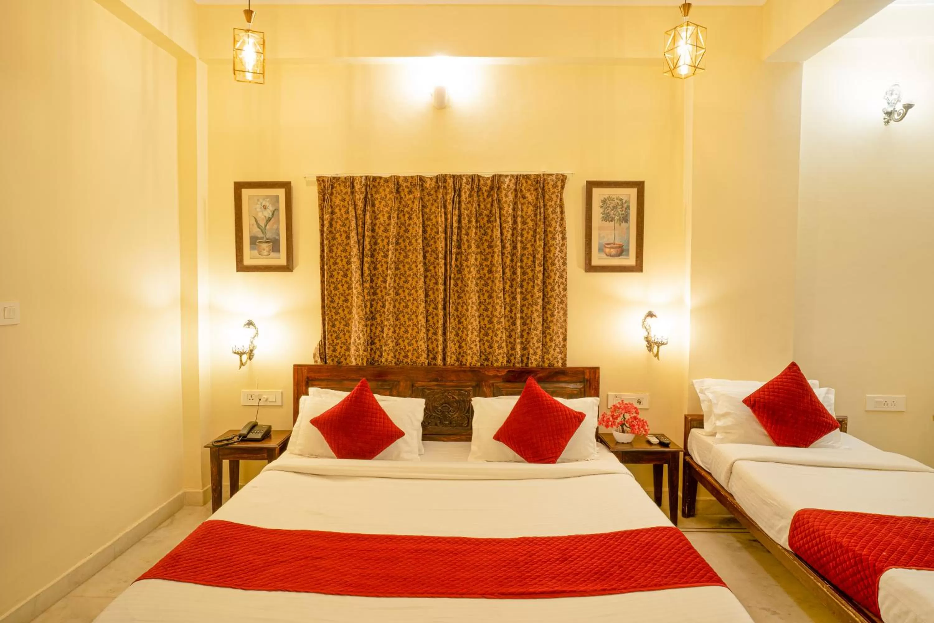Bed in Tripli Hotels Shiv Villas