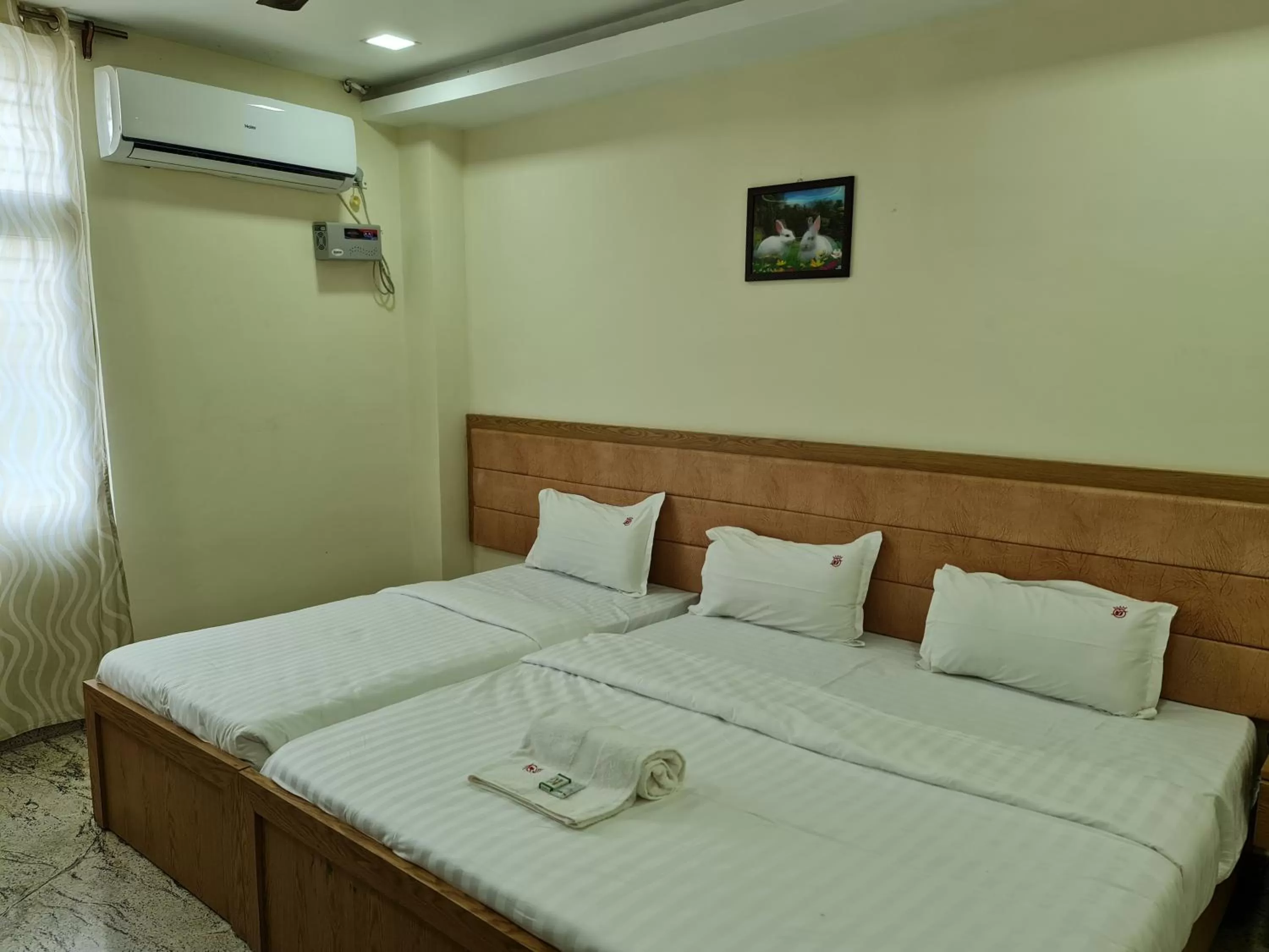 Bed in Vijay Shree Inn