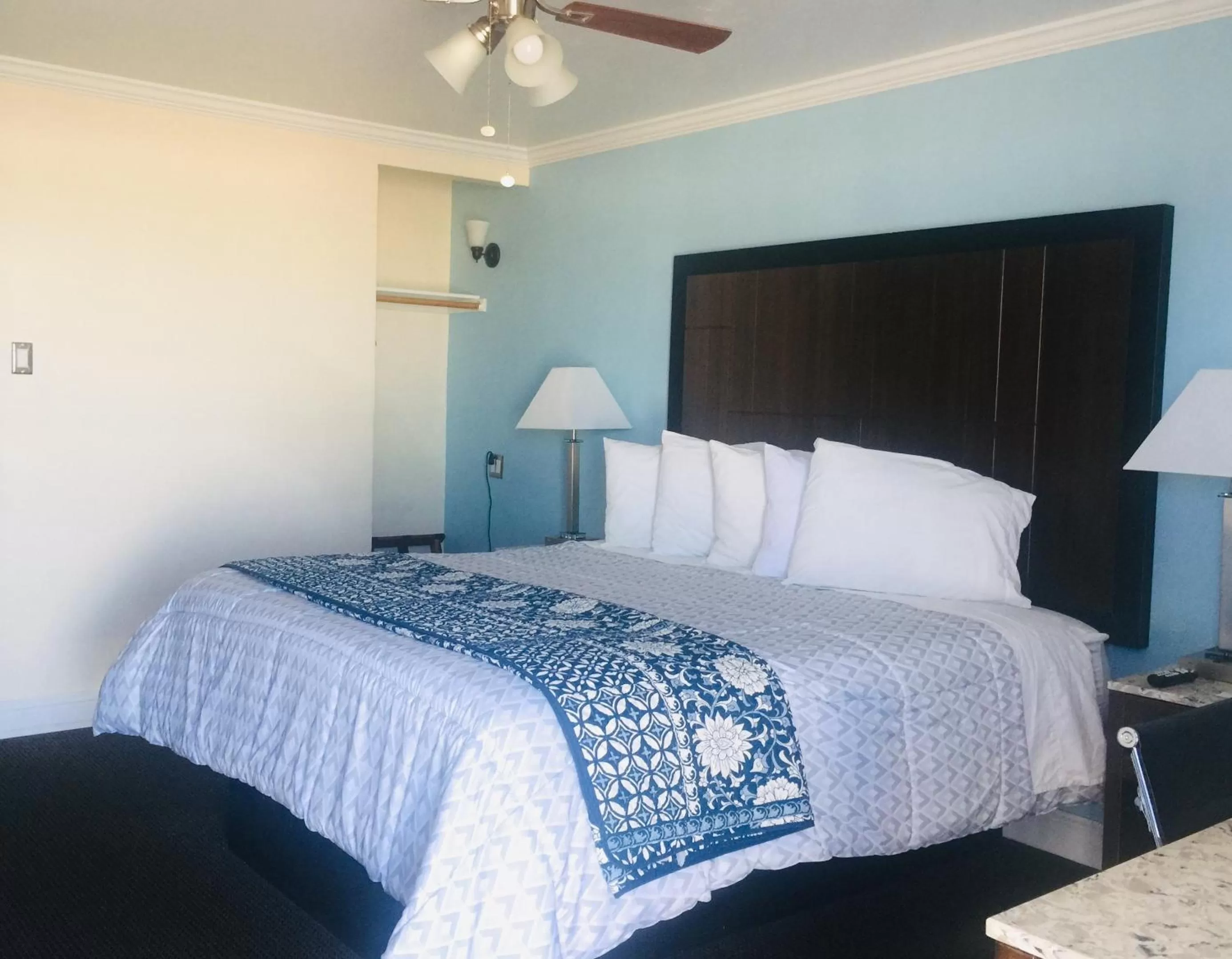 Bed in Dolphin Cove Motel