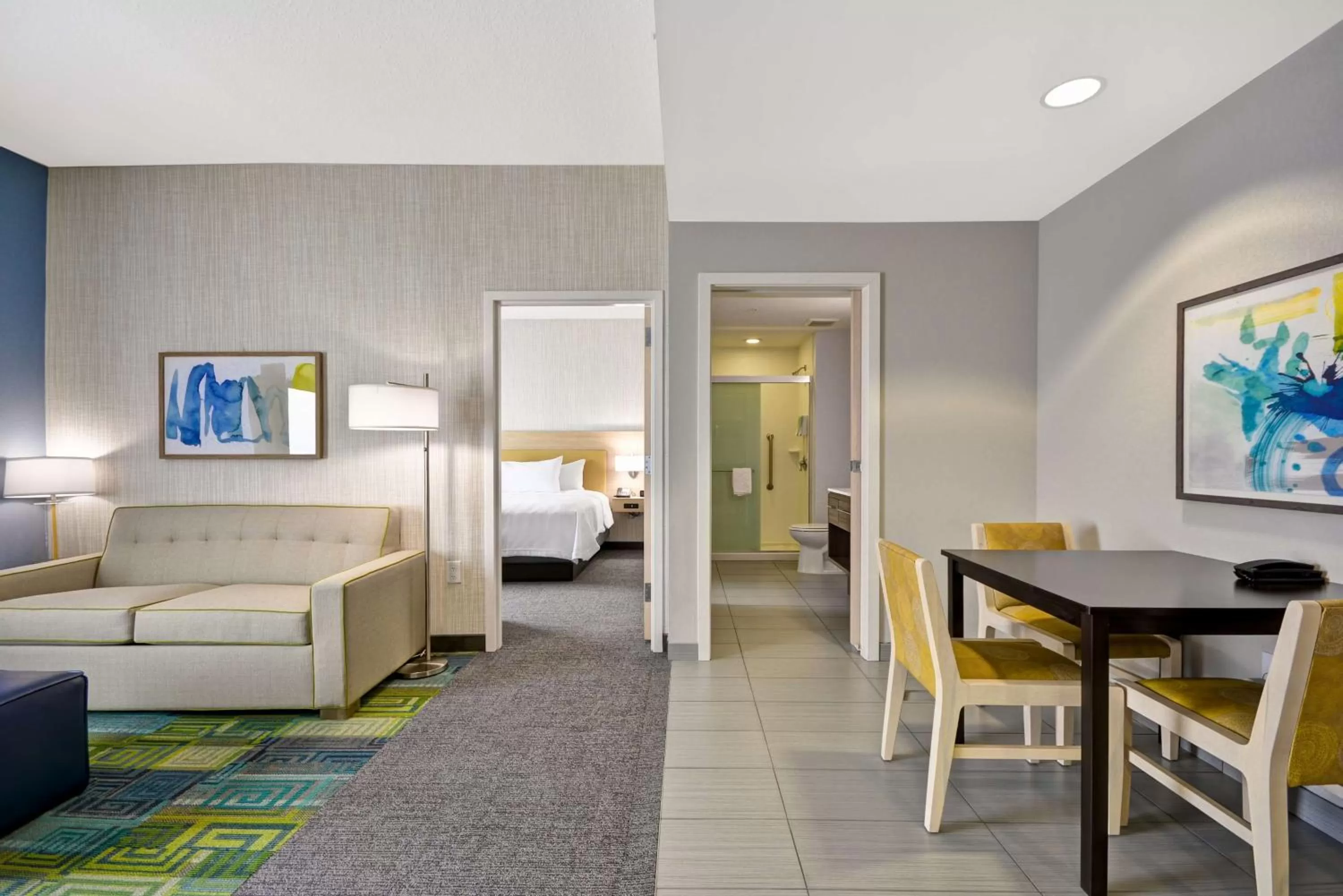 Living room, Bed in Home2 Suites By Hilton Blue Ash Cincinnati