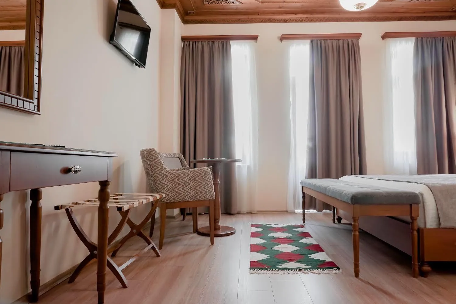 Seating area, Bed in Hotel Argjiro