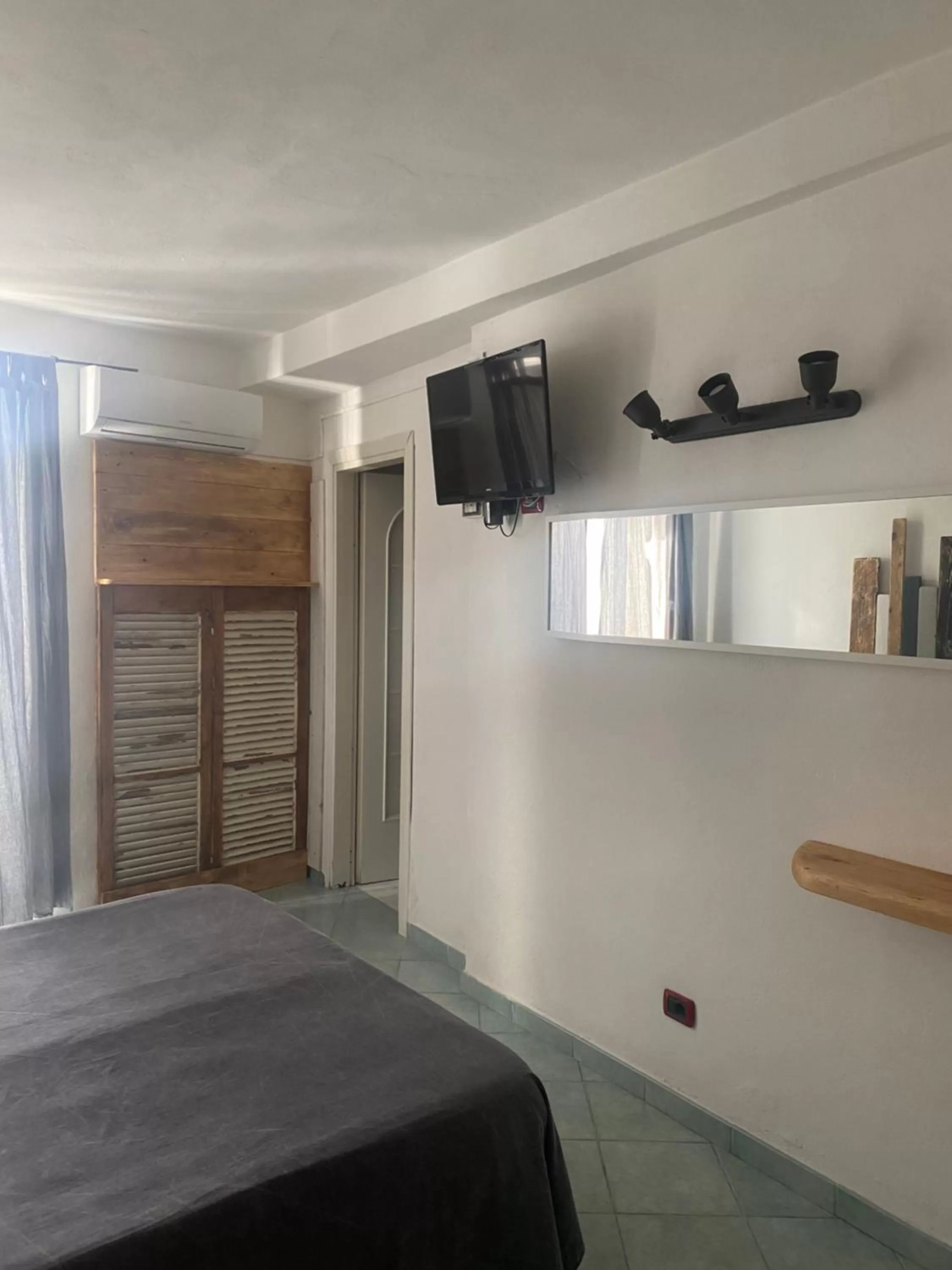 Bedroom in Black Market Hotel