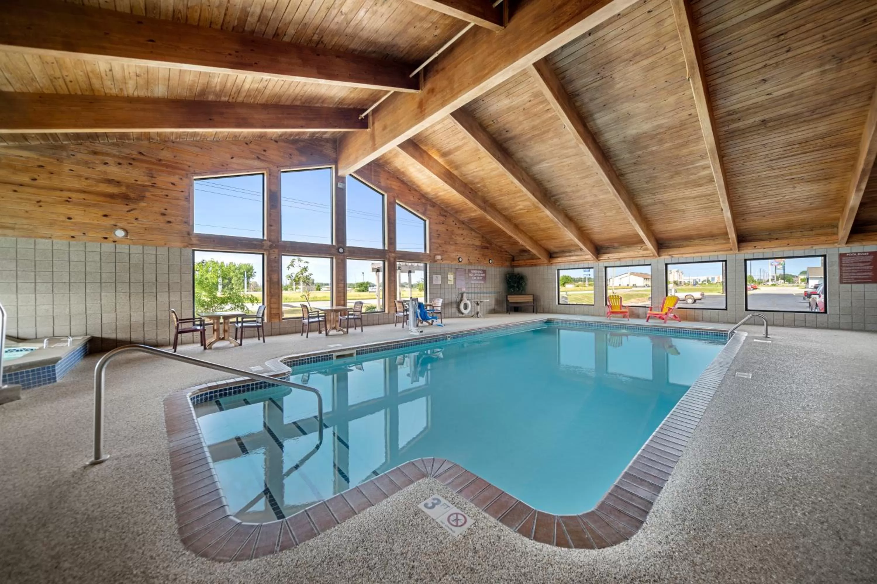 Swimming pool in AmericInn by Wyndham Ames