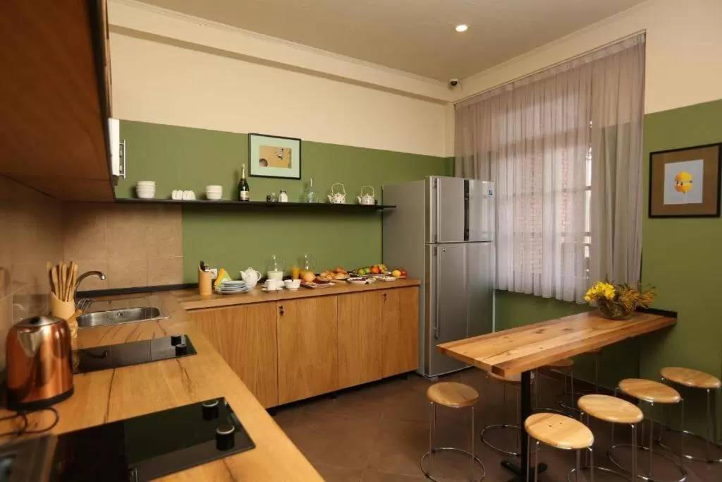 Kitchen or kitchenette, Kitchen/Kitchenette in Kindli Hotel