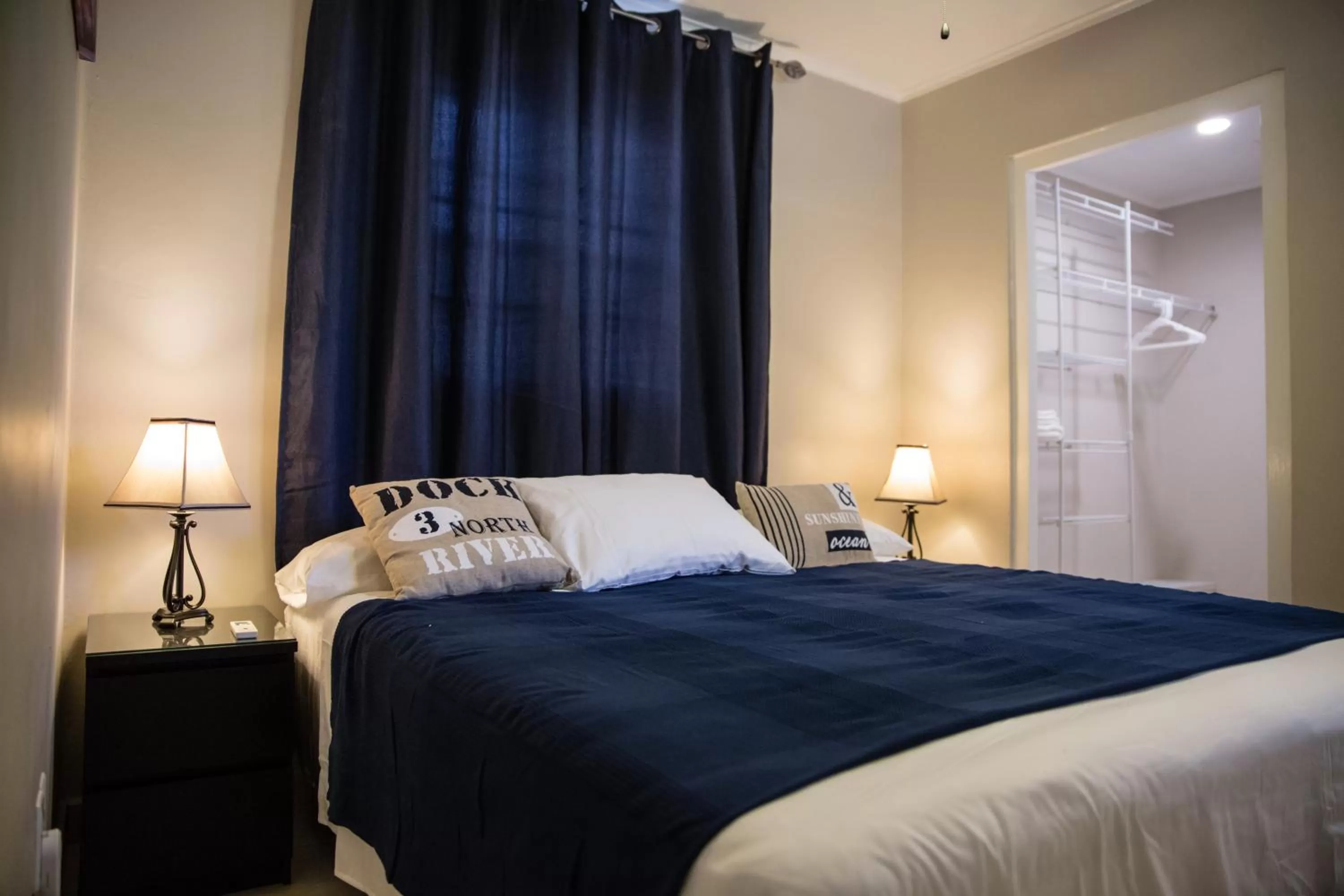 Bed in The Pier Beach Inn & Suites