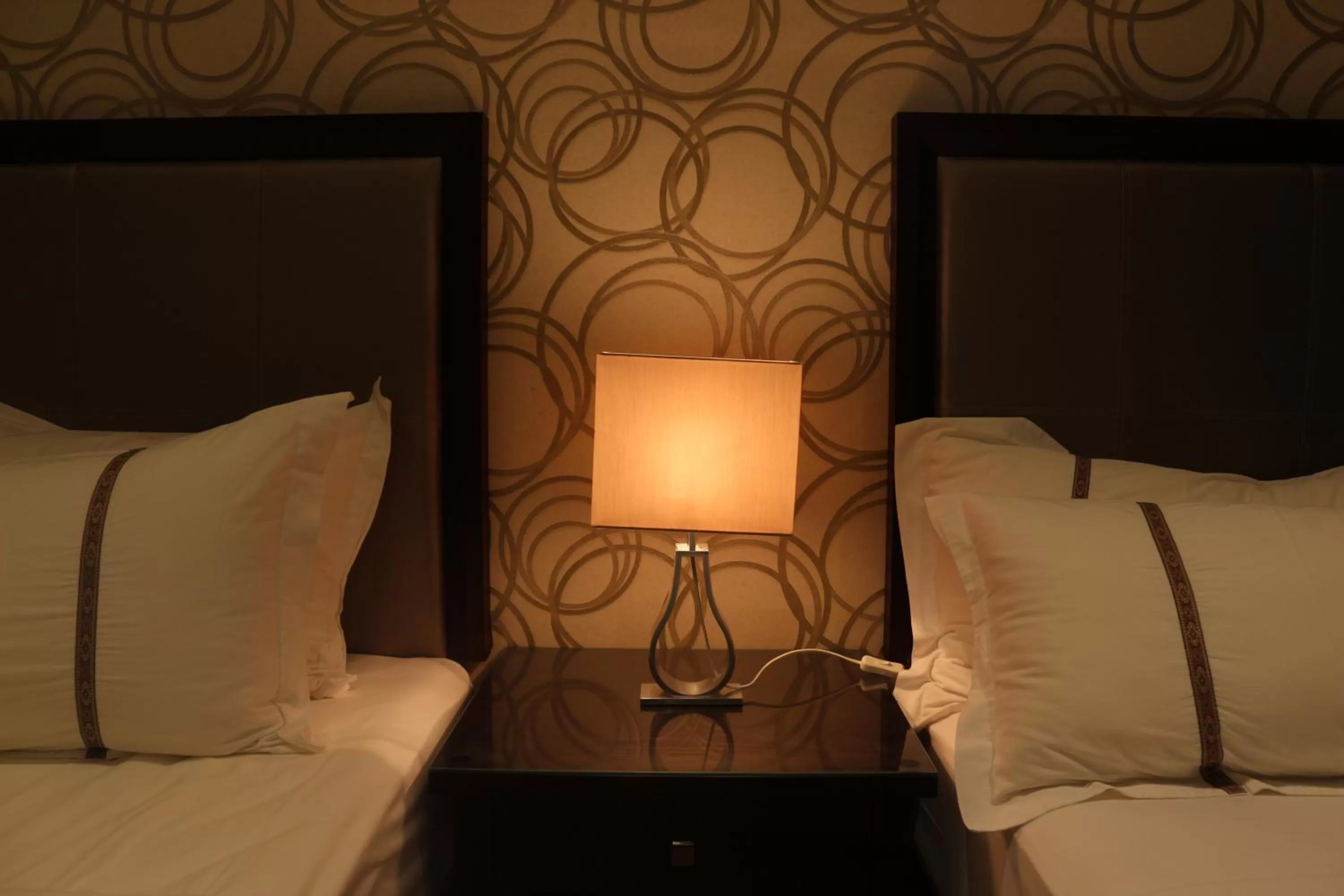 Decorative detail, Bed in Nooryana Suites and Apartments