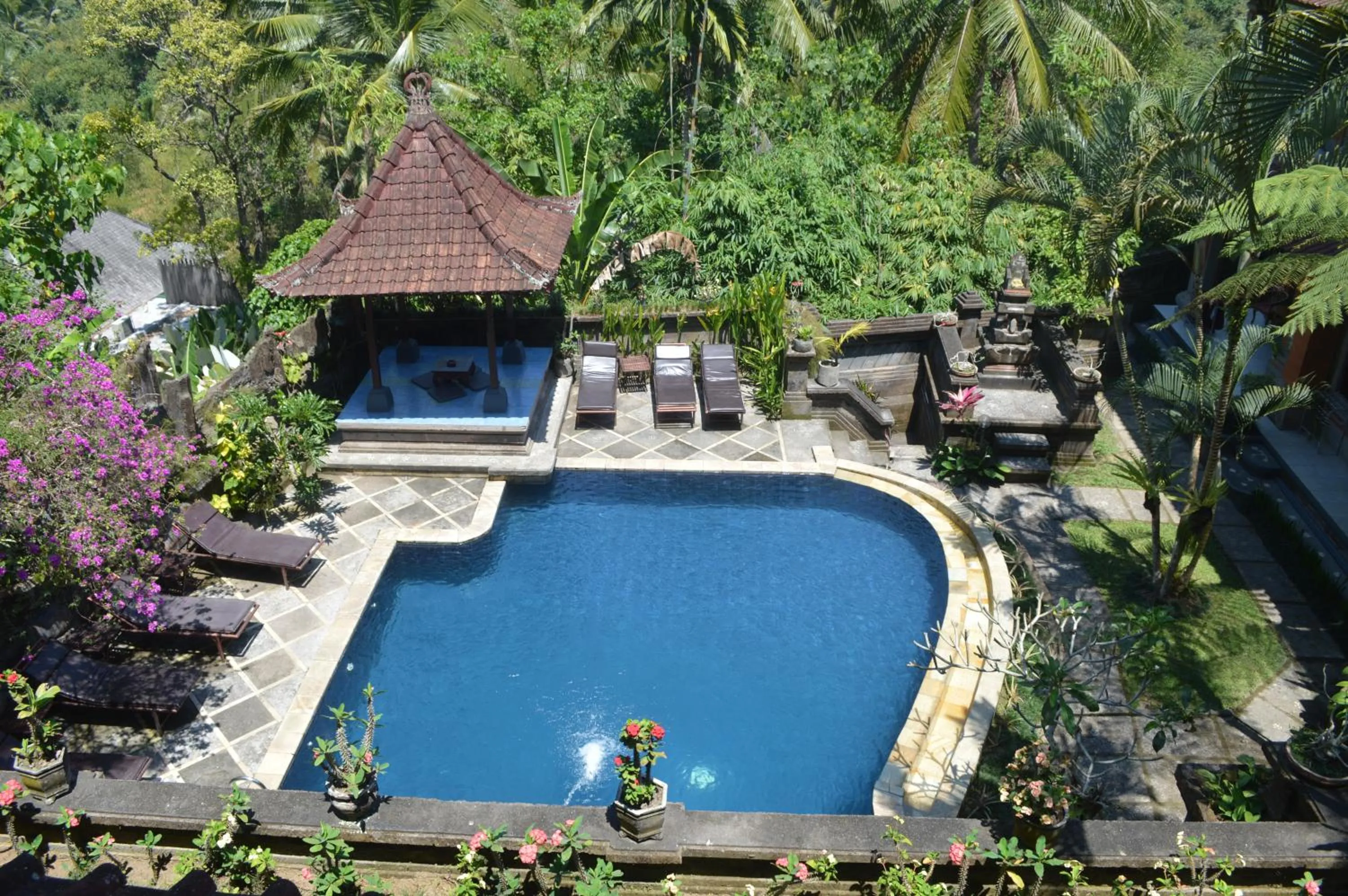 Swimming pool in Nick's Hidden Cottages by Mahaputra
