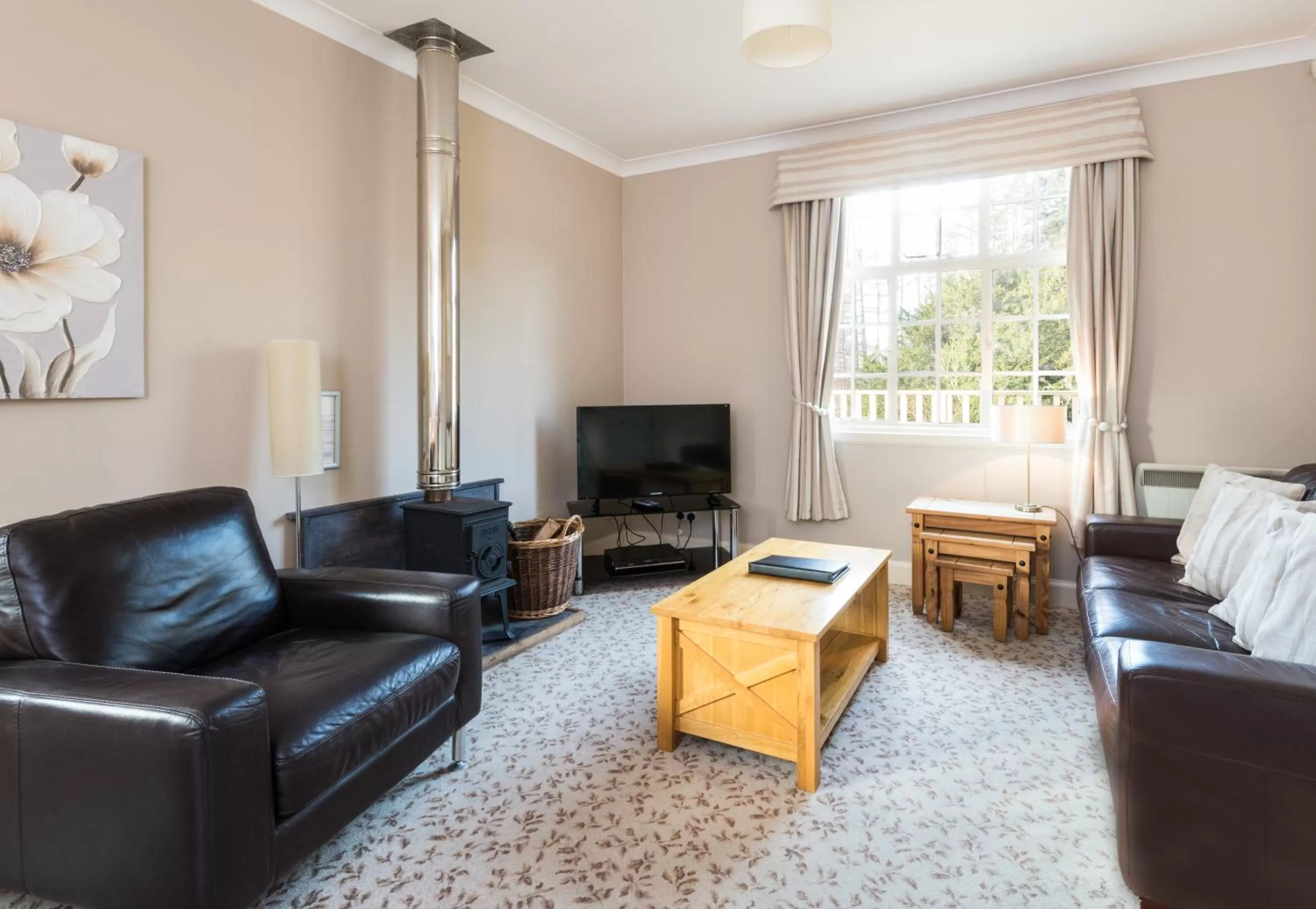 Communal lounge/ TV room in The Atholl Palace