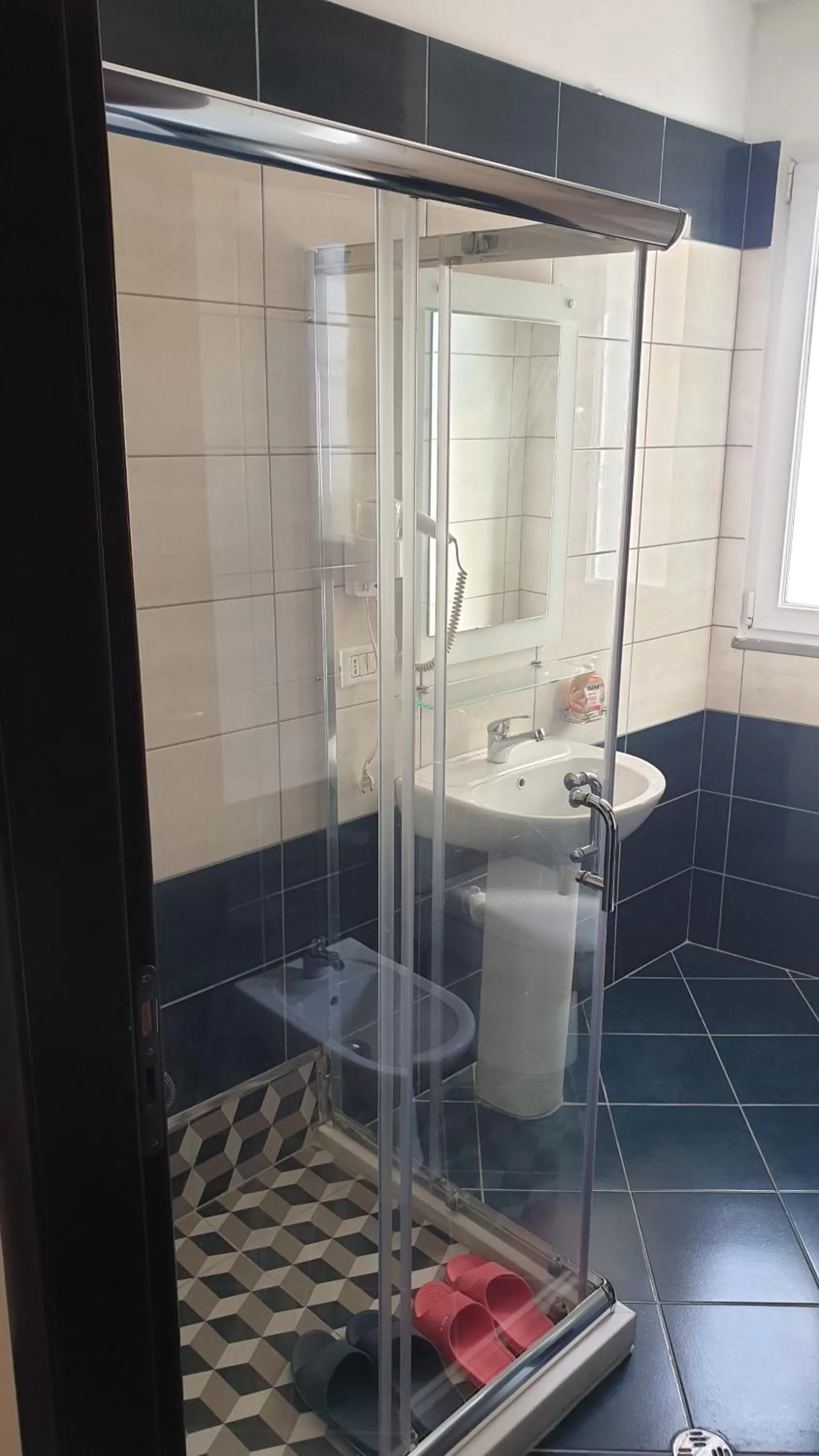 Bathroom in Haris Hotel