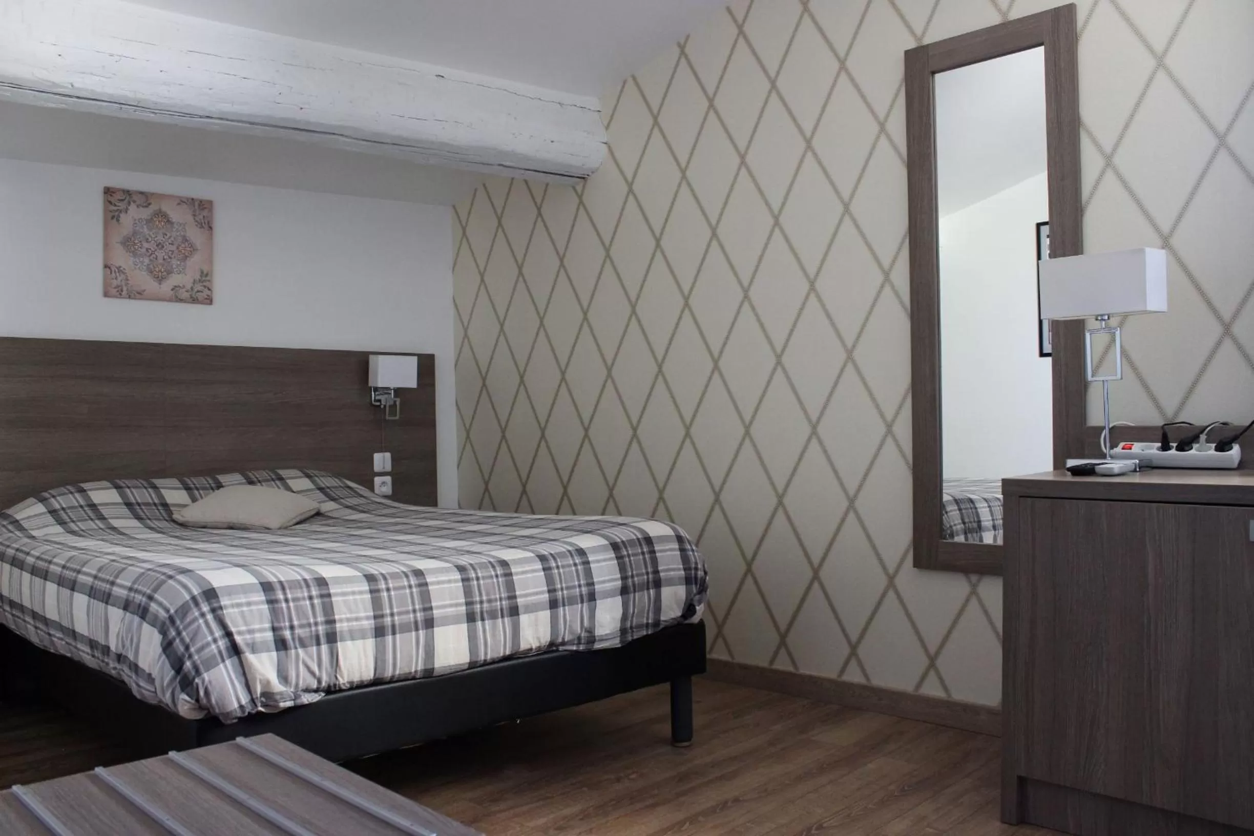 Bed in Le Grand Hôtel Molière