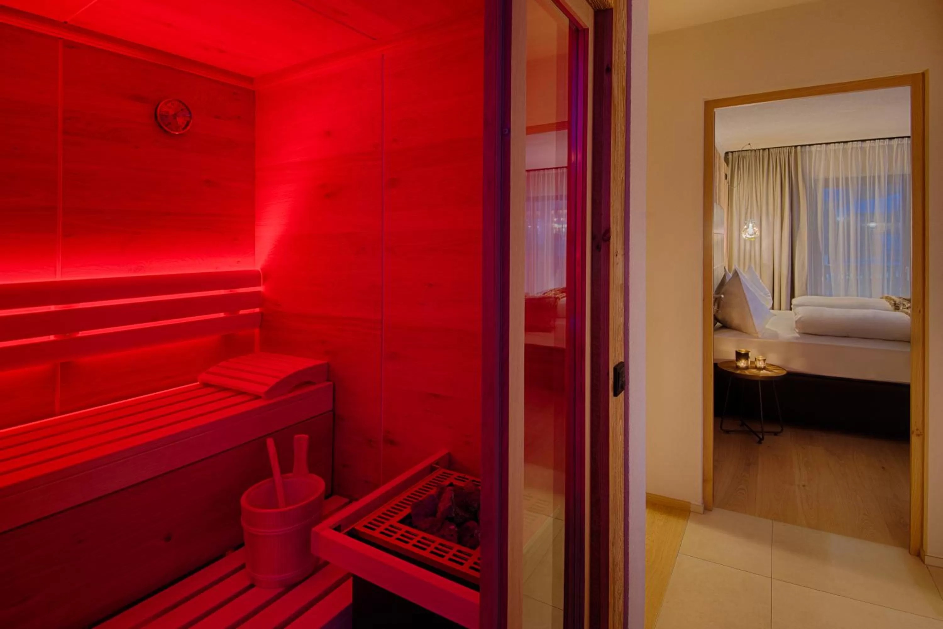 Sauna, Bed in K1 Mountain Chalet - Luxury Apartements