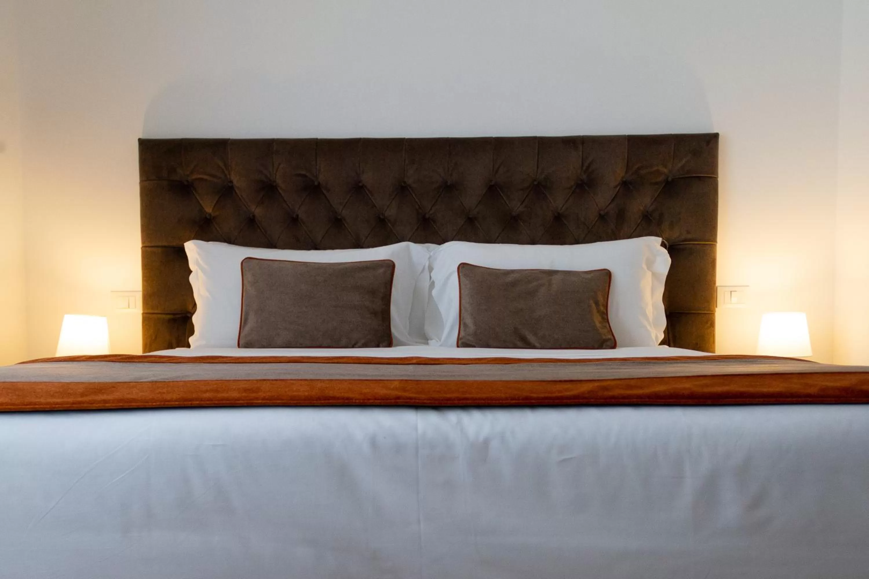 Bed in Michelangelo Vatican Rooms